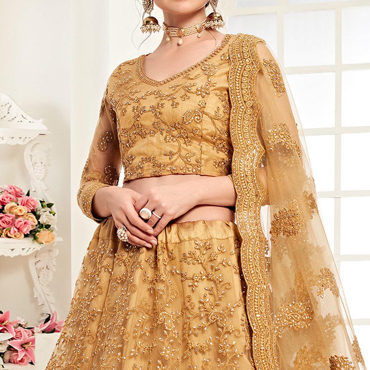 Engrossing Mustard Yellow Colored Cording Embroidery Wedding Wear Net Lehenga Choli - Peachmode