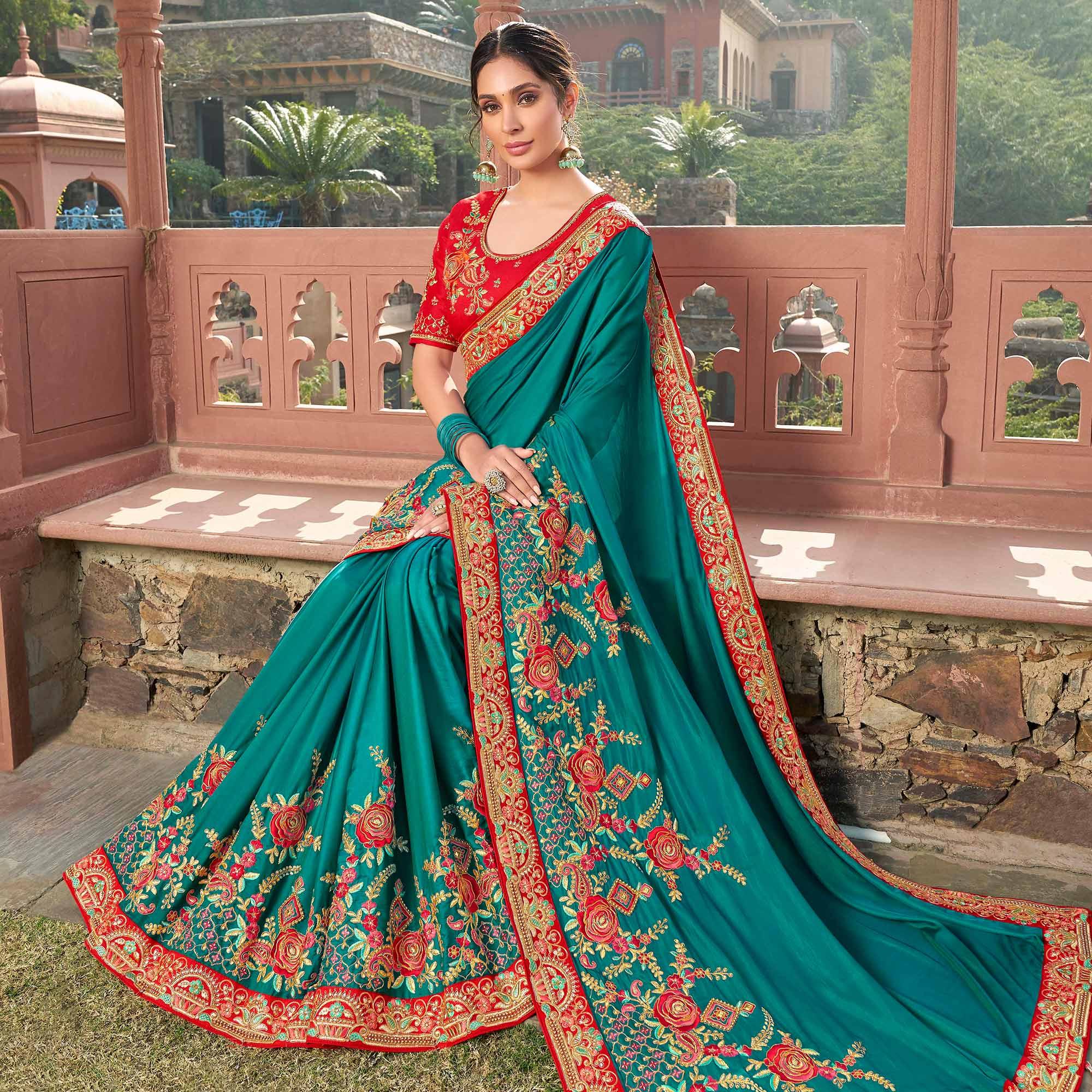 Engrossing Turquoise Blue Colored Partywear Embroidered Satin - Gerogette Saree - Peachmode