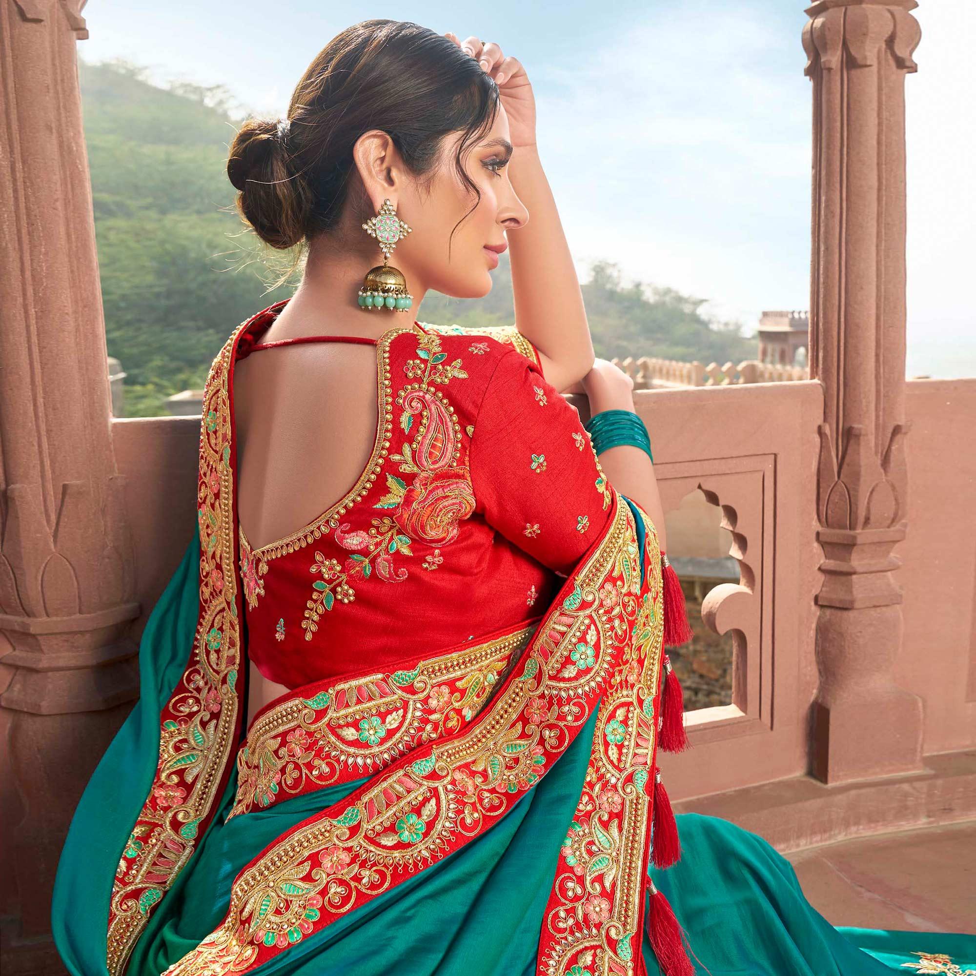 Engrossing Turquoise Blue Colored Partywear Embroidered Satin - Gerogette Saree - Peachmode