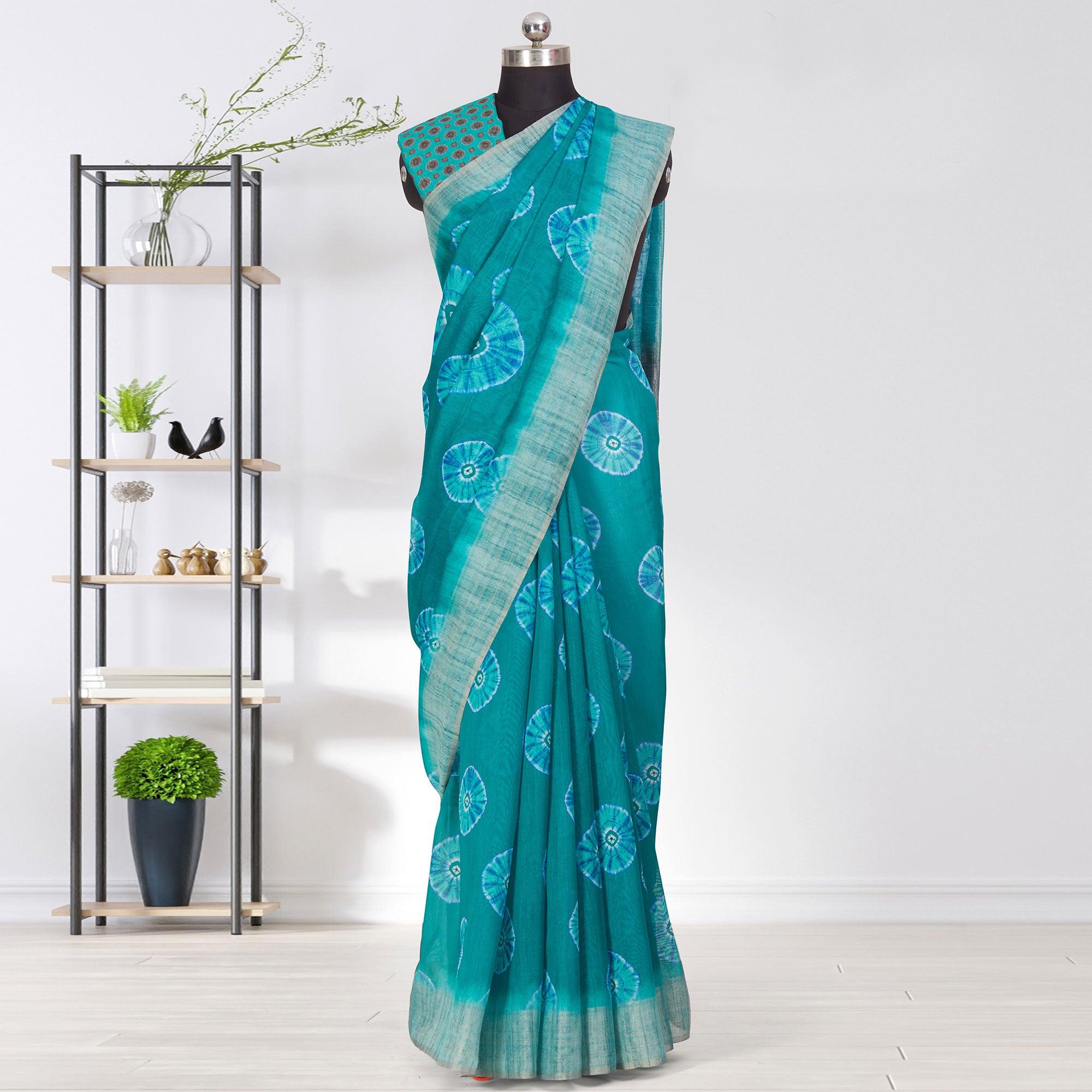 Engrossing Turquoise Coloured Casual Wear Printed Linen Saree - Peachmode