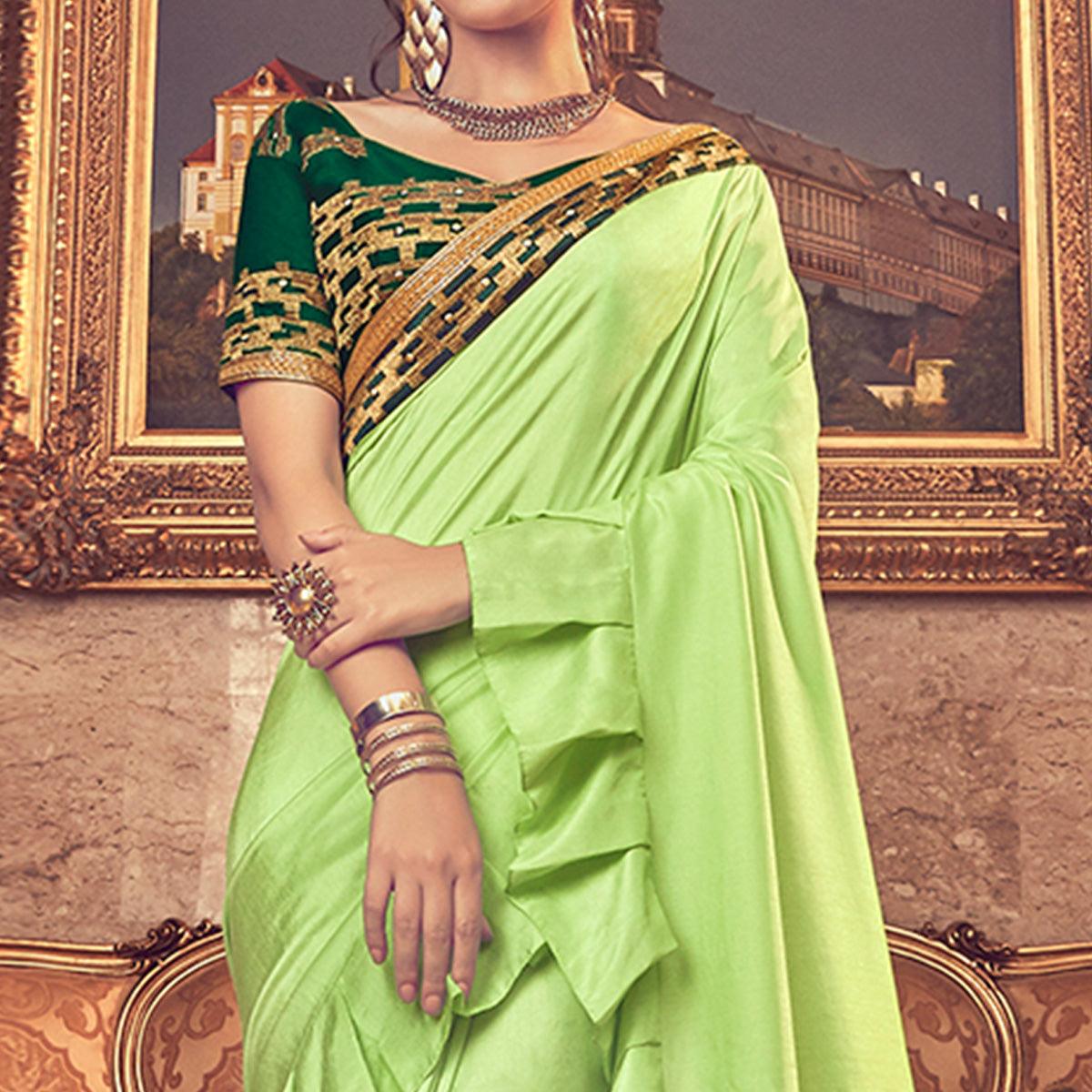 Entrancing Green Colored Partywear Embroidered Georgette Saree - Peachmode