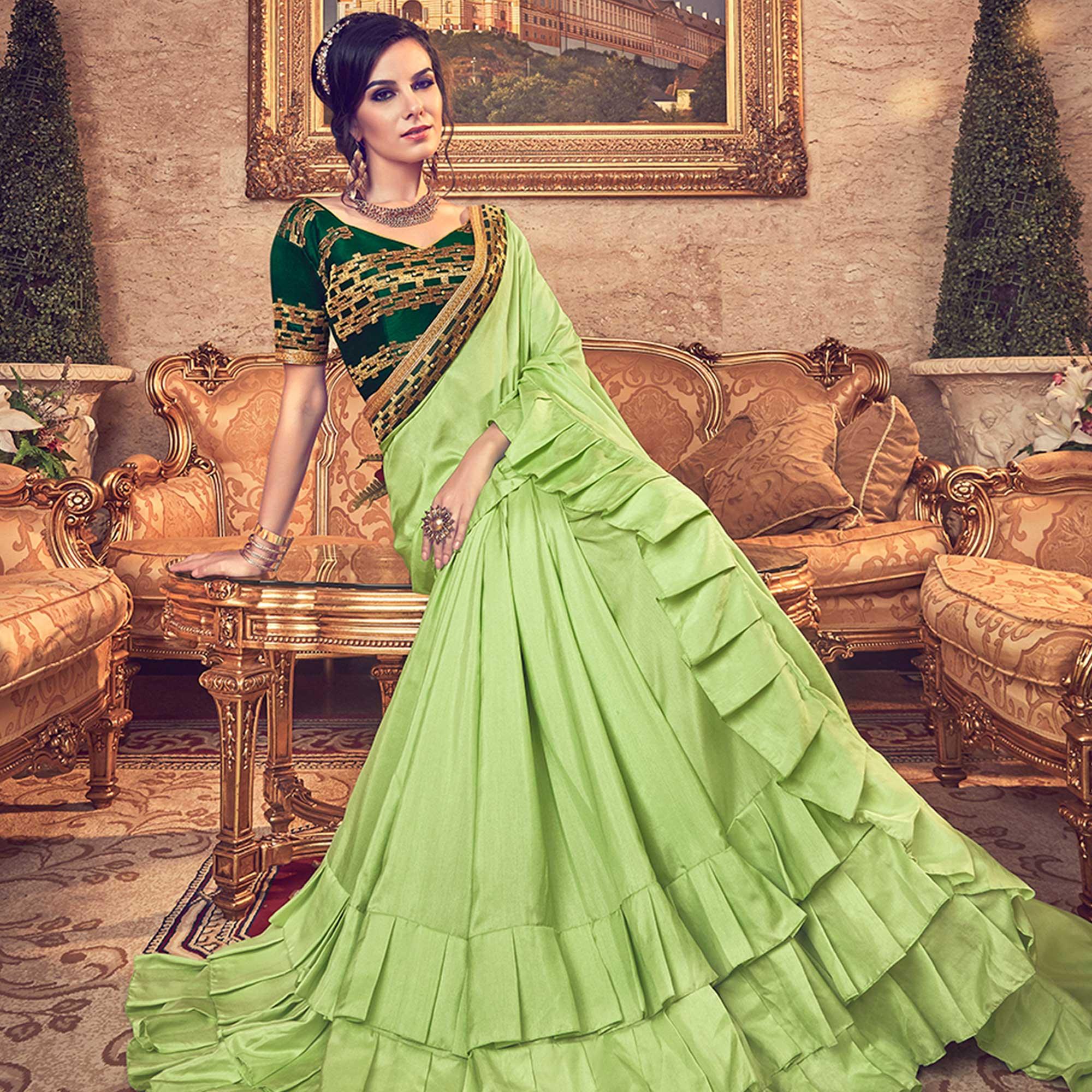 Entrancing Green Colored Partywear Embroidered Georgette Saree - Peachmode
