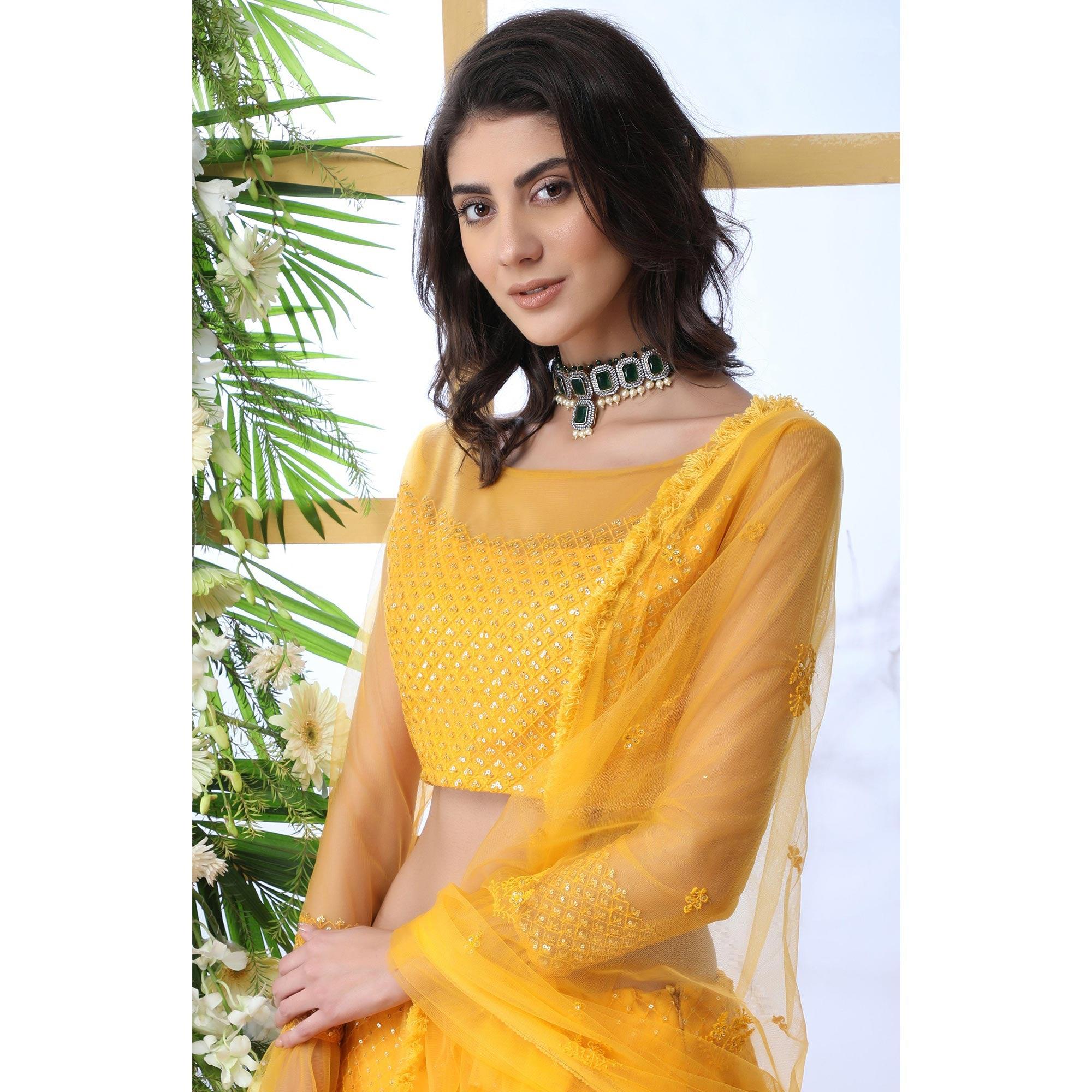 Entrancing Mustard Yellow Colored Partywear Embroidered Netted Lehenga Choli - Peachmode
