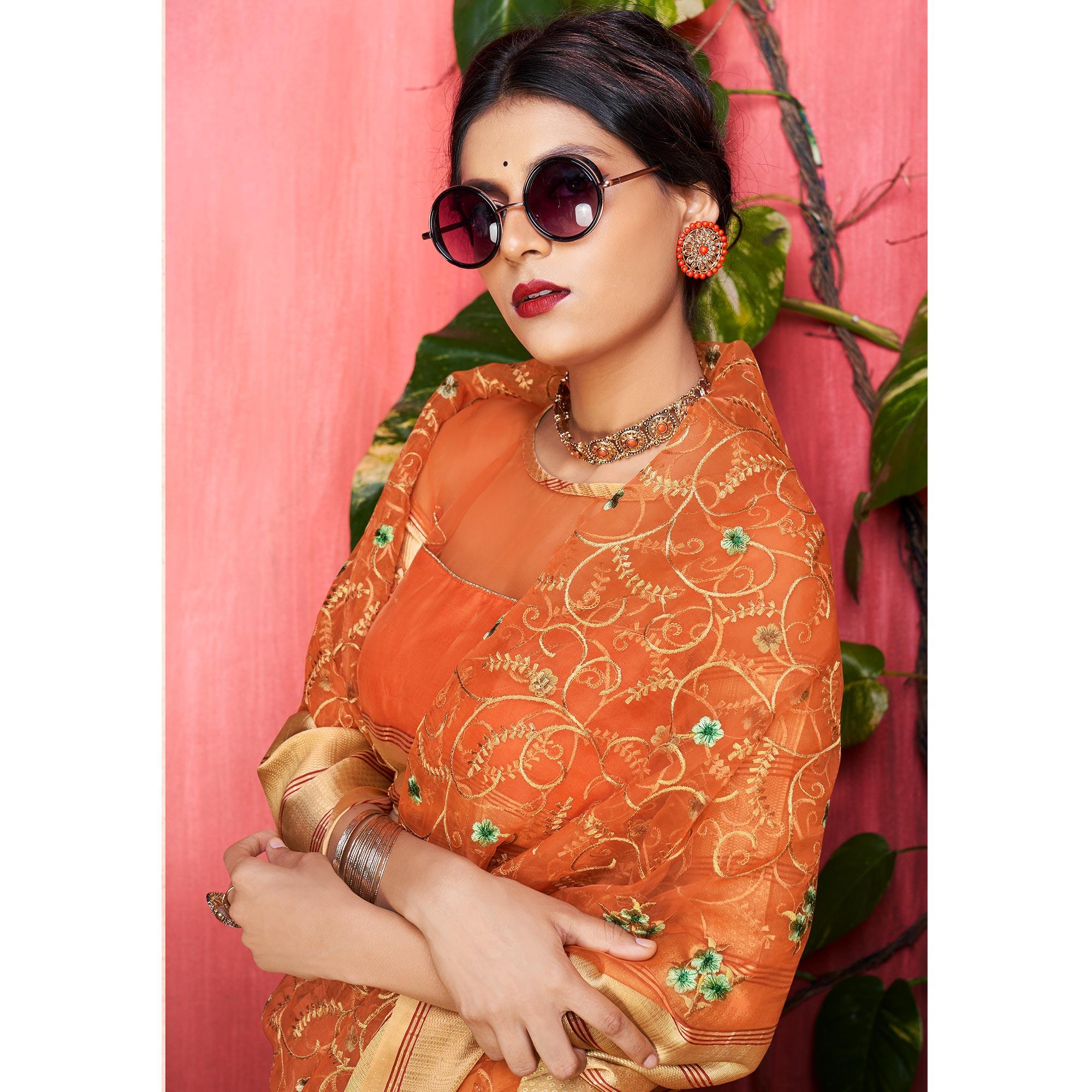 Entrancing Orange Colored Party Wear Floral Embroidered Organza Saree - Peachmode
