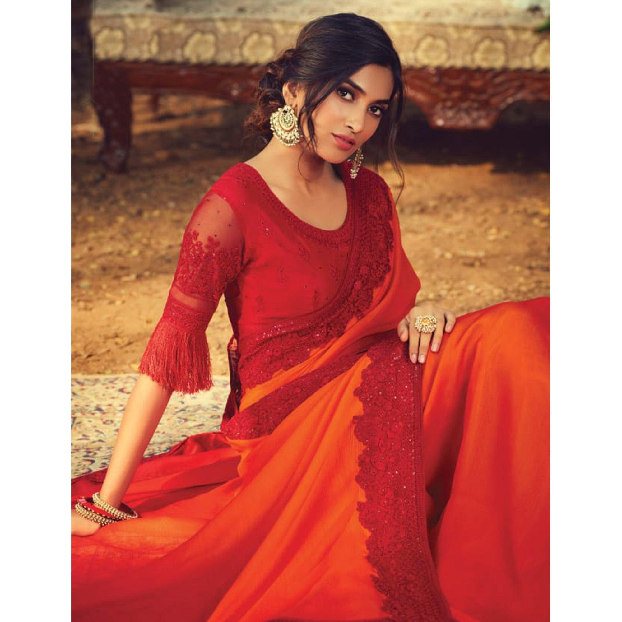 Entrancing Orange Colored Partywear Embroidered Silk Saree - Peachmode