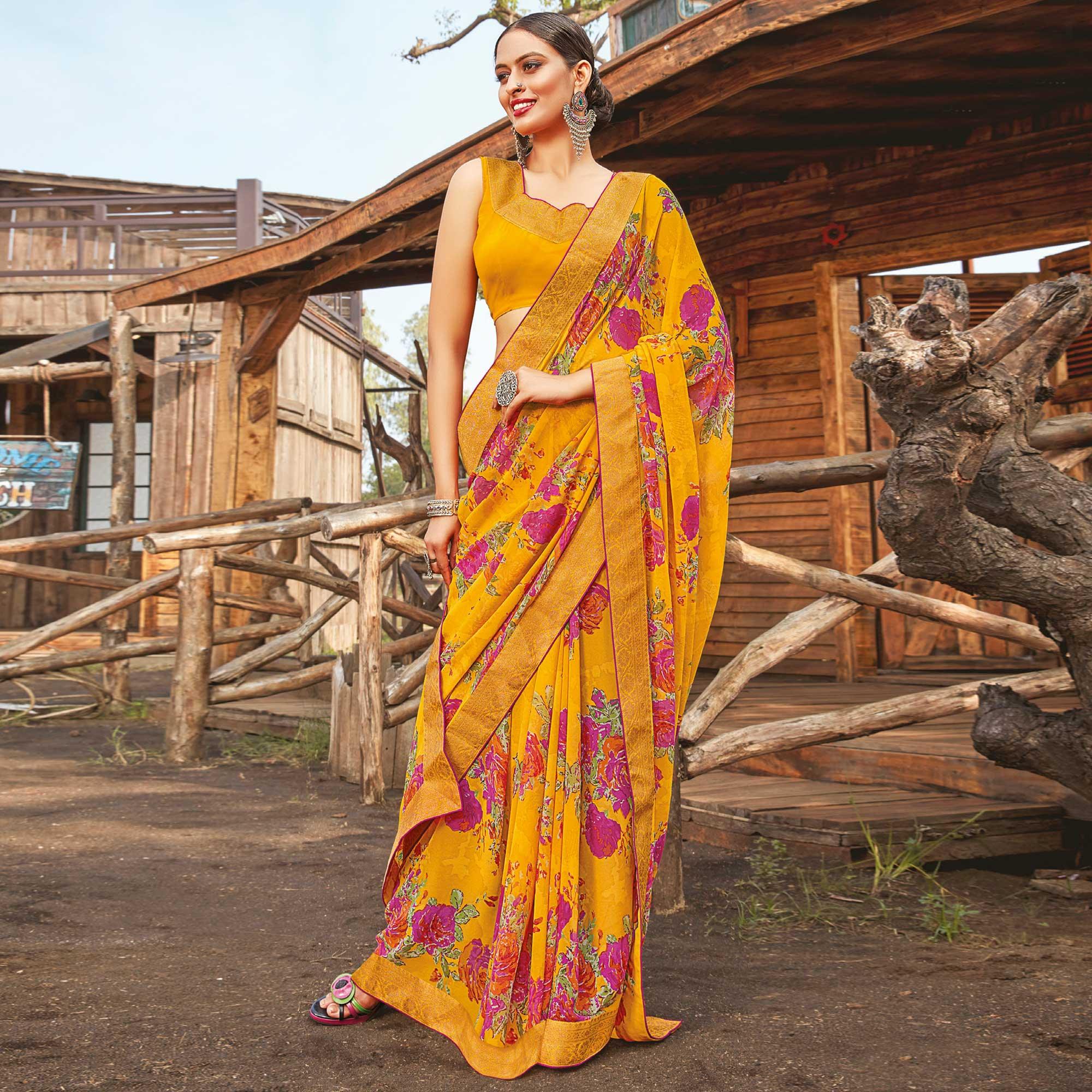 Ethnic Yellow Coloured Partywear Pure Georgette Floral Printed Saree With Fancy Lace Border - Peachmode