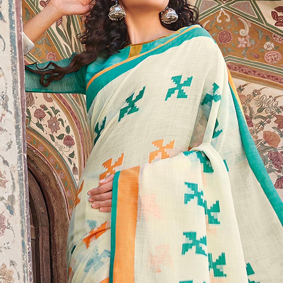 Excellent Cream Colored Casual Printed Linen Cotton Saree With Tassels - Peachmode
