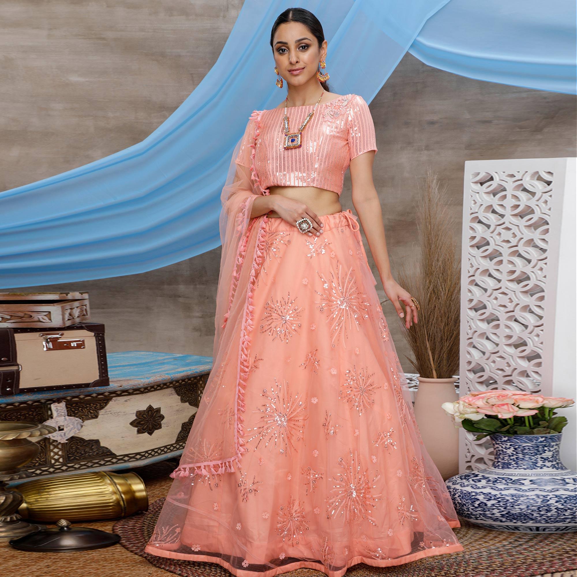 Excellent Orange Colored Designer Partywear Embroidered Net Lehenga Choli - Peachmode