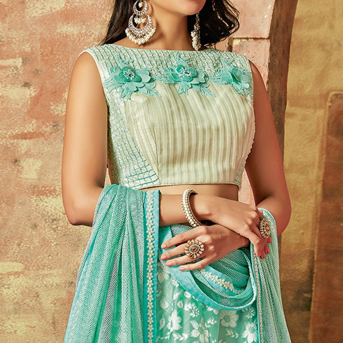 Excellent Sea Green Colored Partywear Embroidered Tissue Lehenga Choli - Peachmode
