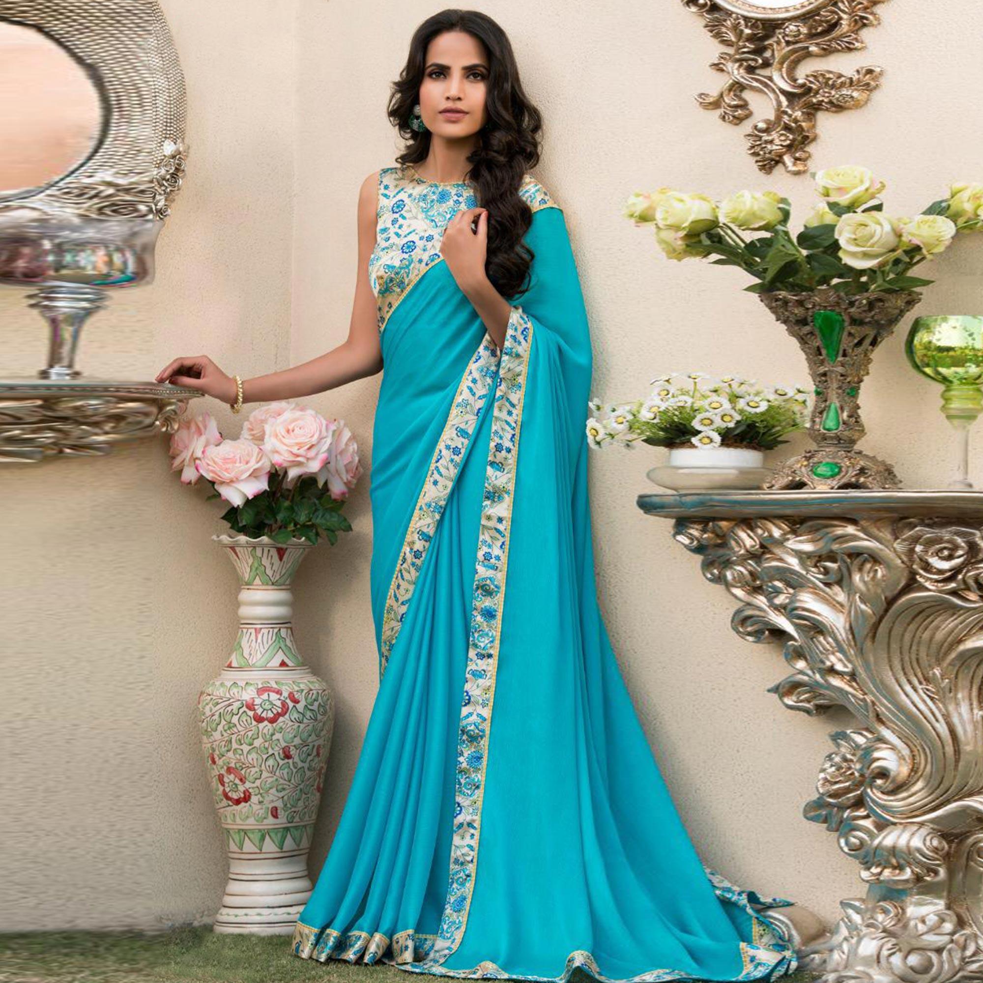 Exceptional Aqua Blue Colored Partywear Printed Chiffon Saree - Peachmode