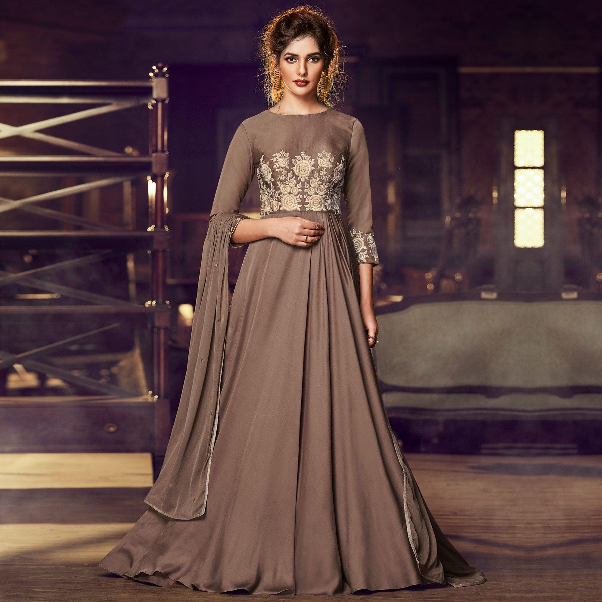 Exclusive Brown Colored Partywear Embroidered Modal Satin Gown With Dupatta - Peachmode