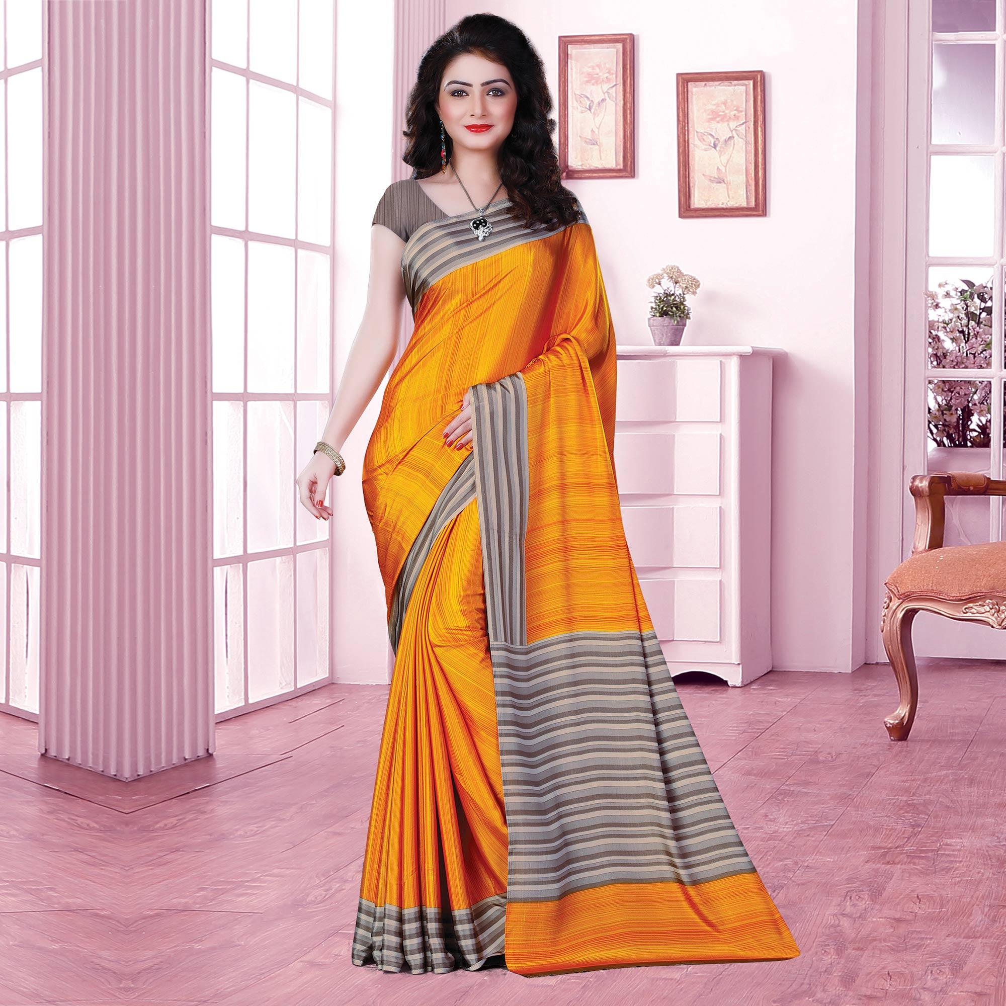 Exclusive Mustard Coloured Casual Wear Printed Crepe Saree - Peachmode