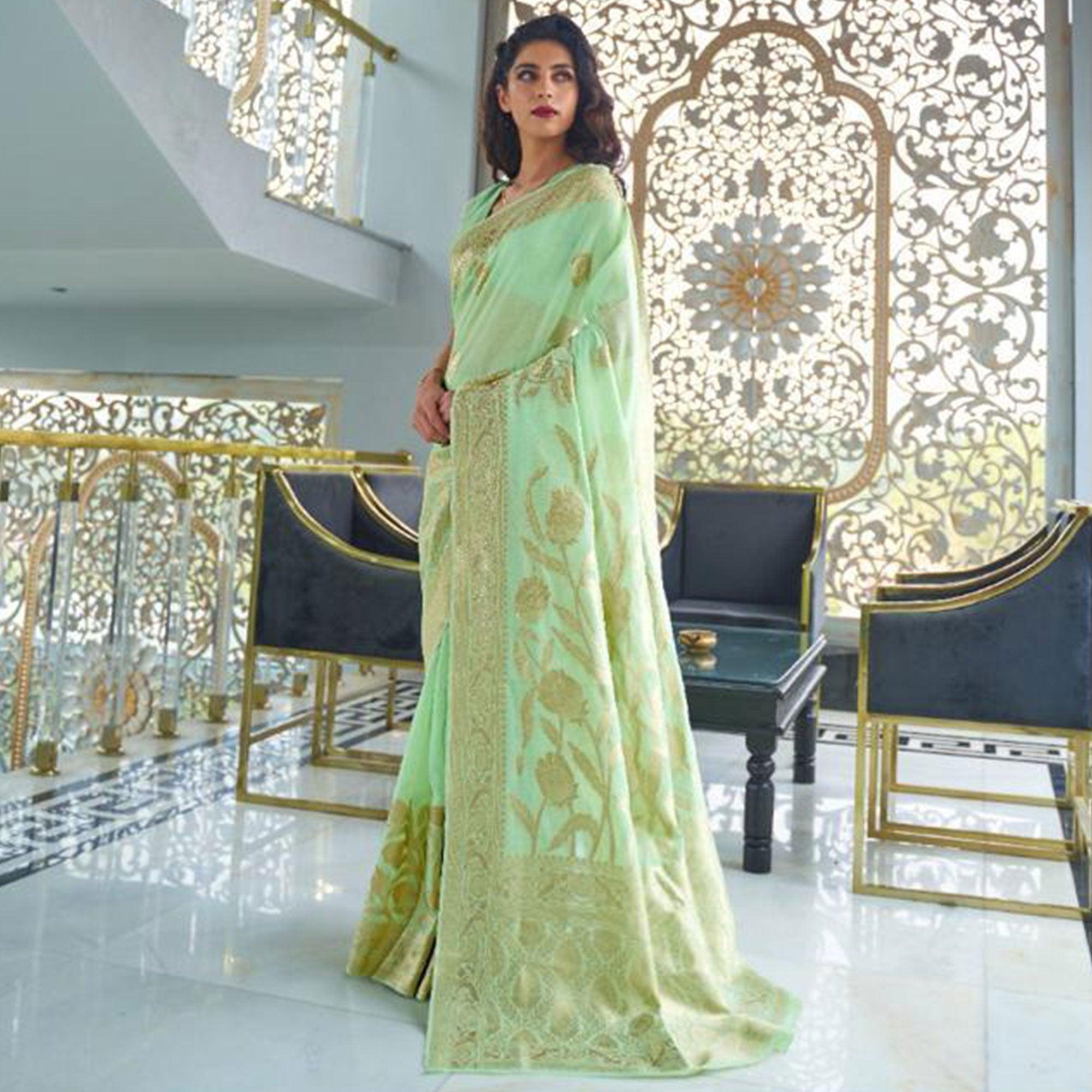 Exclusive Pista Green Coloured Partywear Pure Modal Woven Silk Saree - Peachmode