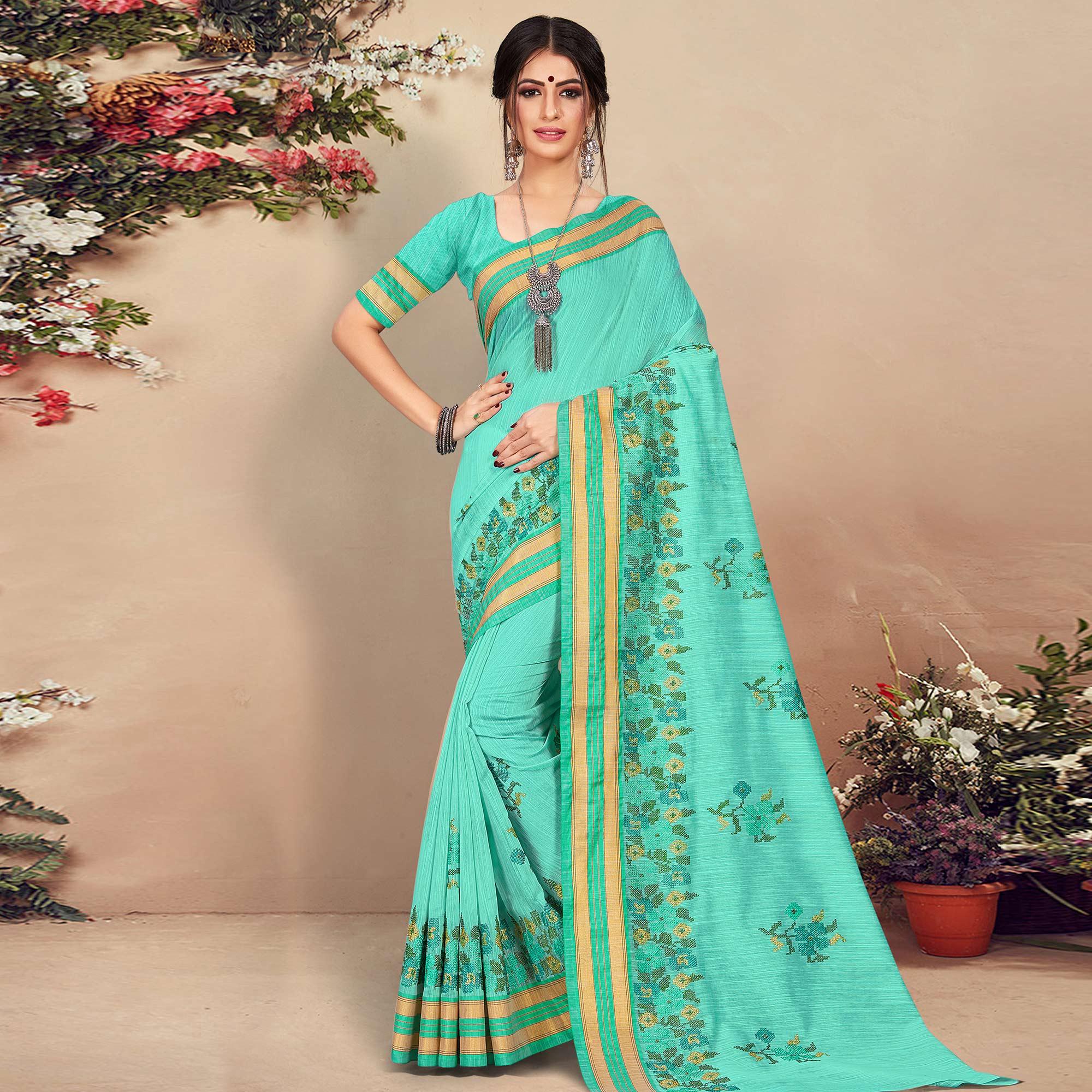 Exotic Aqua Blue Colored Casual Wear Floral Printed Cotton Saree - Peachmode
