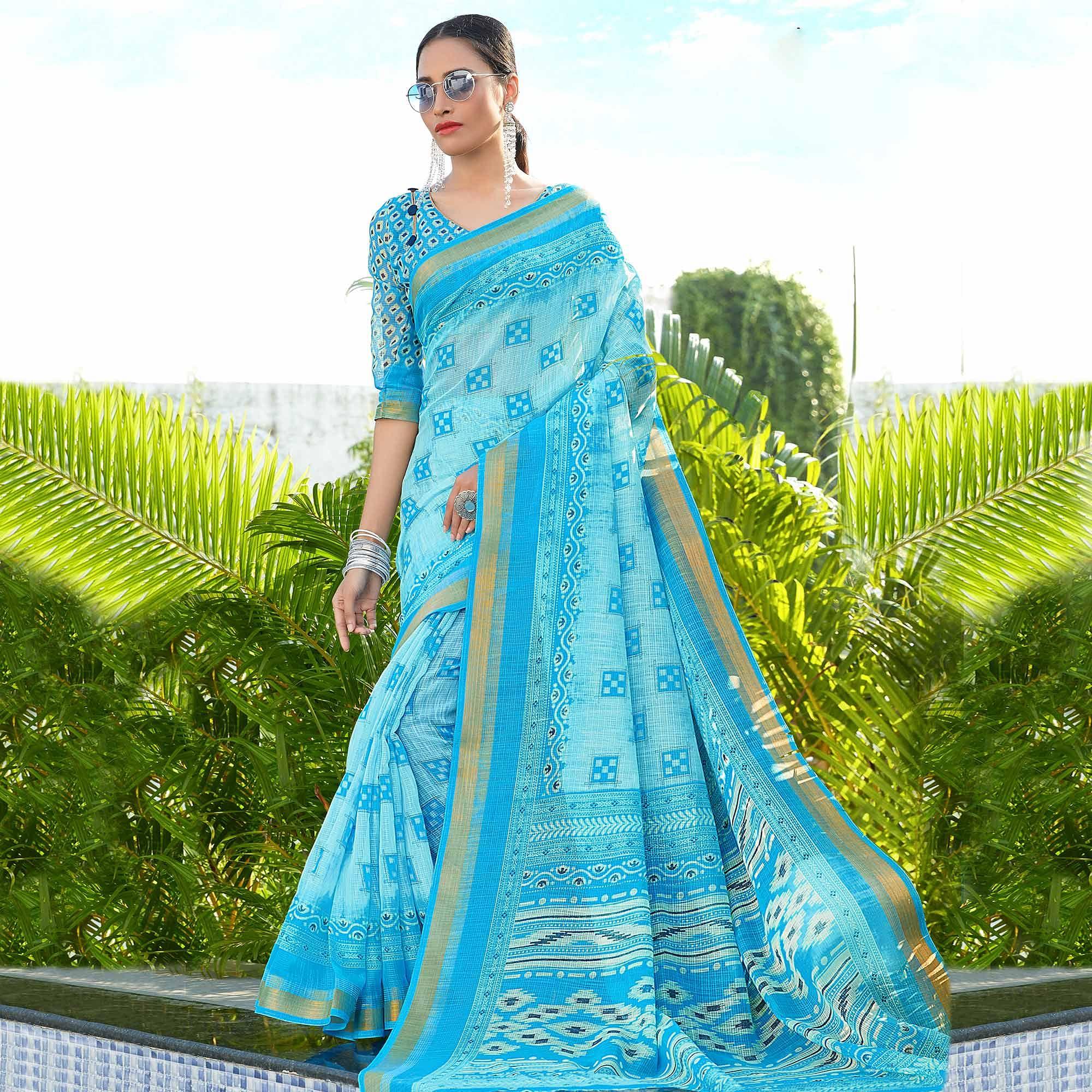 Exotic Blue Colored Casual Wear Printed Cotton Saree - Peachmode