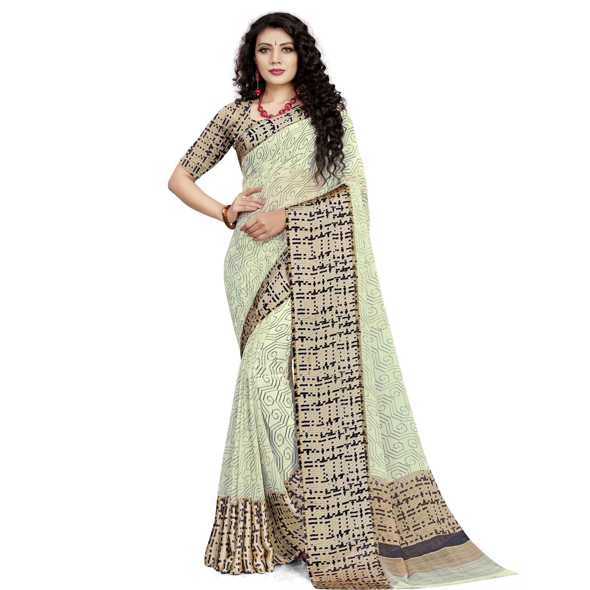 Exotic Cream Colored Casual Wear Printed Georgette Saree - Peachmode