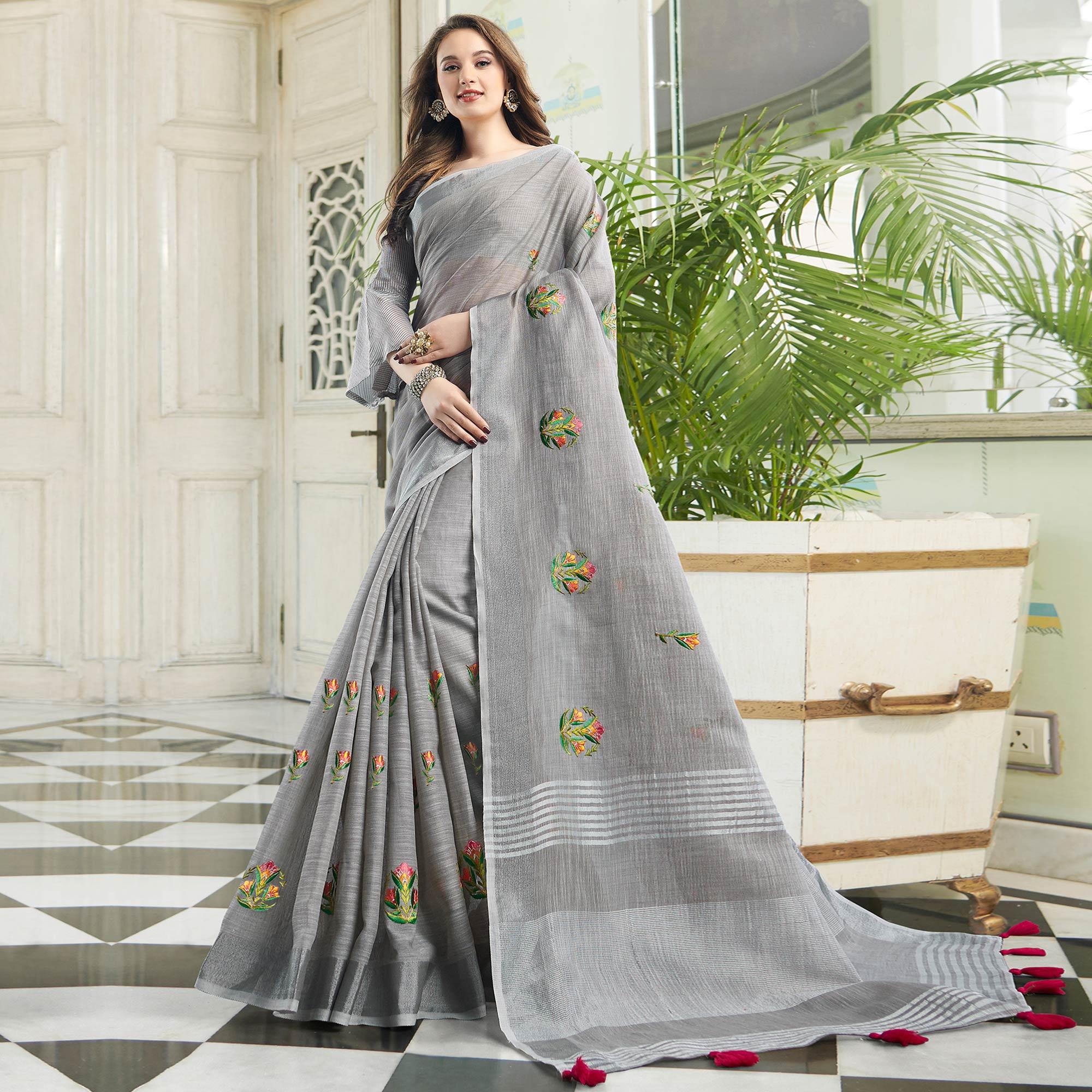 Exotic Grey Colored Casual Wear Floral Embroidered Linen-Cotton Saree With Tassels - Peachmode