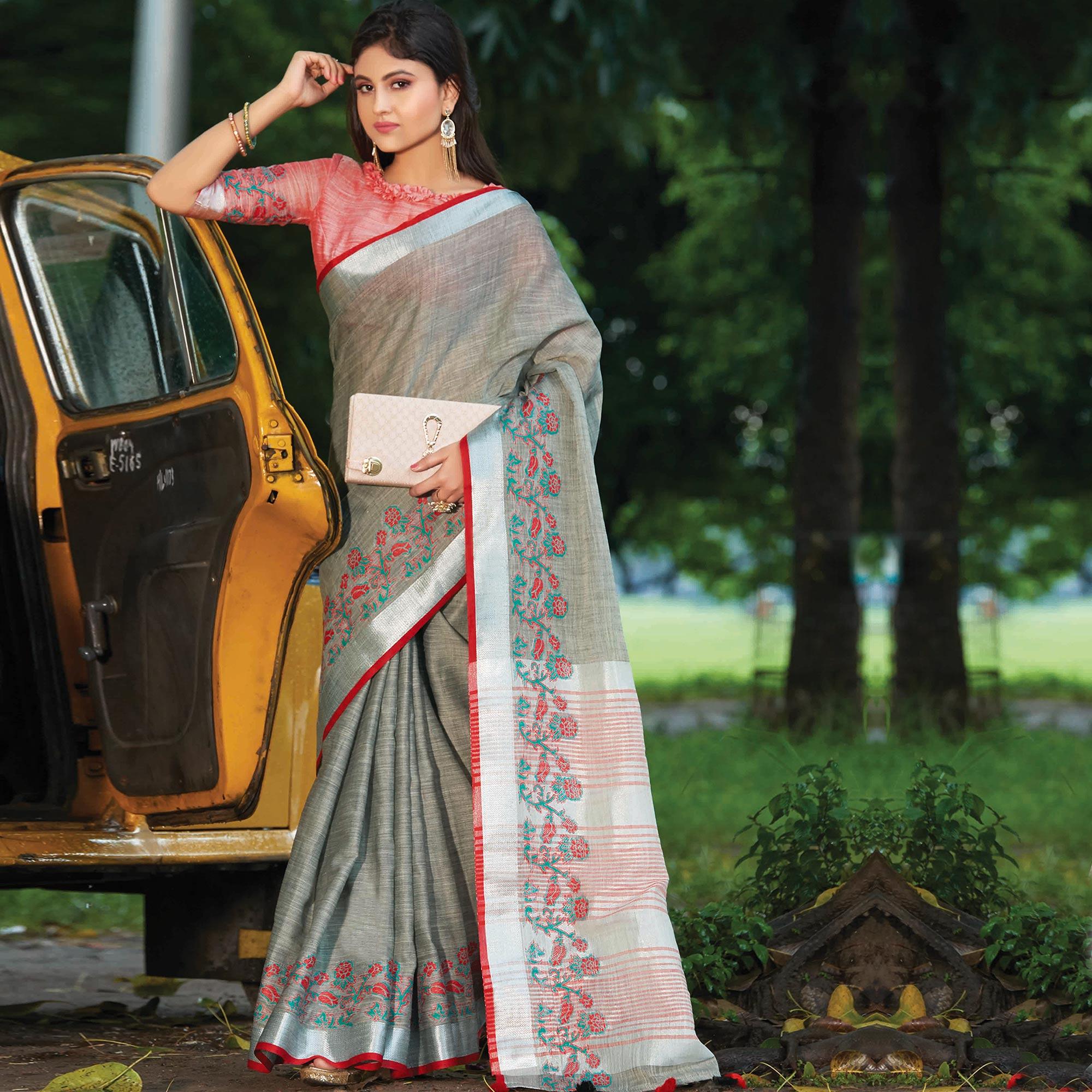 Exotic Grey Colored Festive Wear Floral Embroidered Linen Saree With Tassels - Peachmode