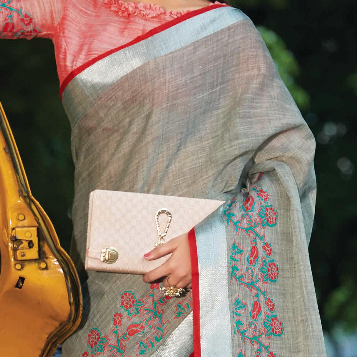 Exotic Grey Colored Festive Wear Floral Embroidered Linen Saree With Tassels - Peachmode