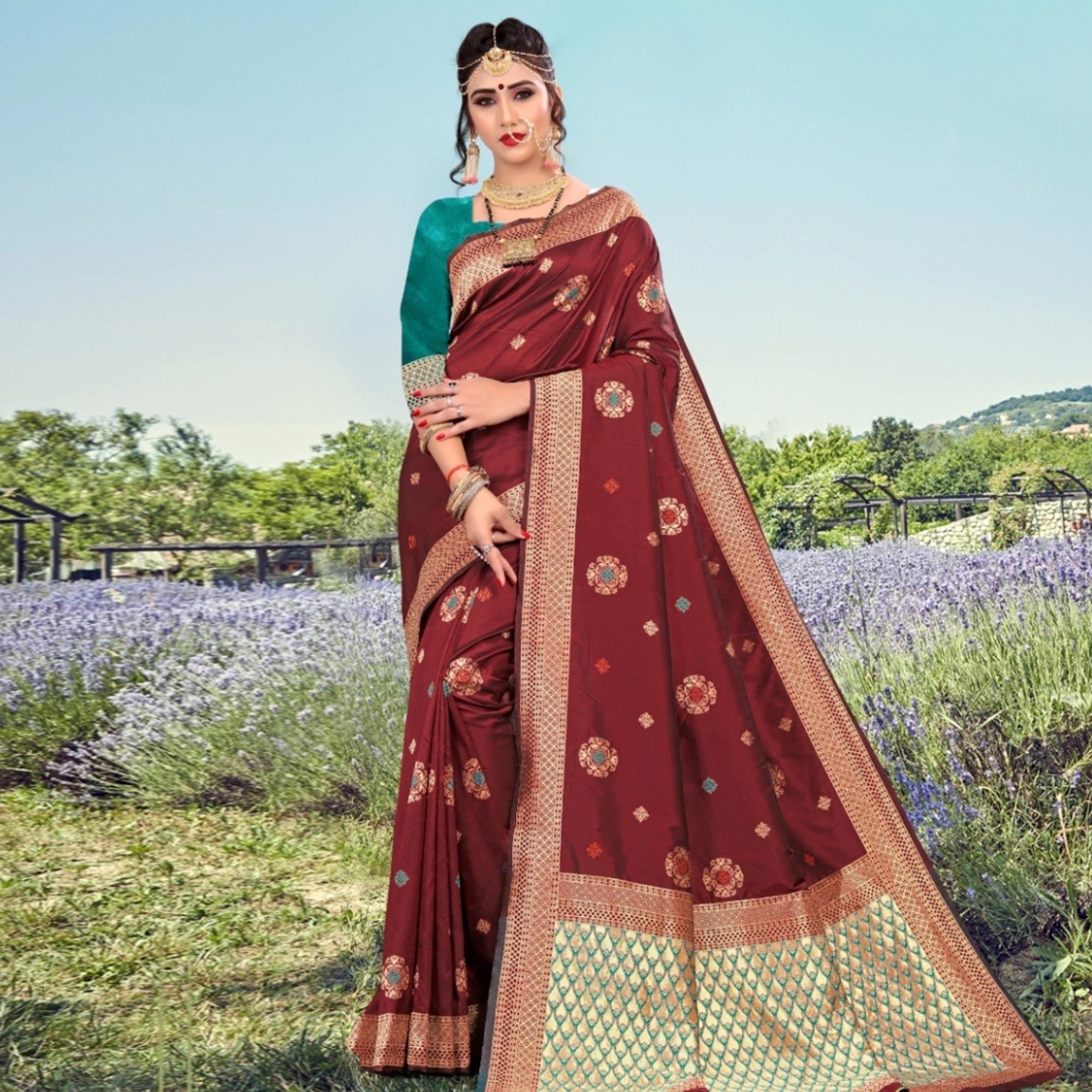 Exotic Maroon Colored Festive Wear Woven Lichi Silk Saree - Peachmode