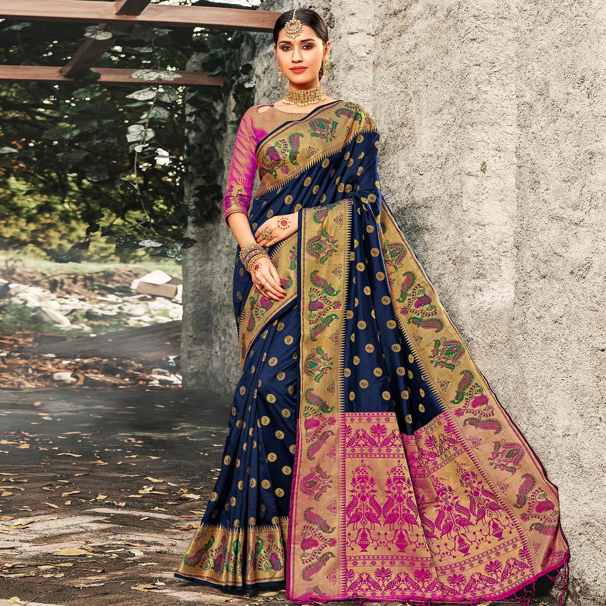 Exotic Navy Blue Colored Festive Wear Woven Banarasi Silk Saree With Tassels - Peachmode