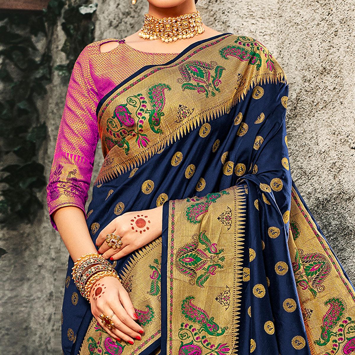 Exotic Navy Blue Colored Festive Wear Woven Banarasi Silk Saree With Tassels - Peachmode