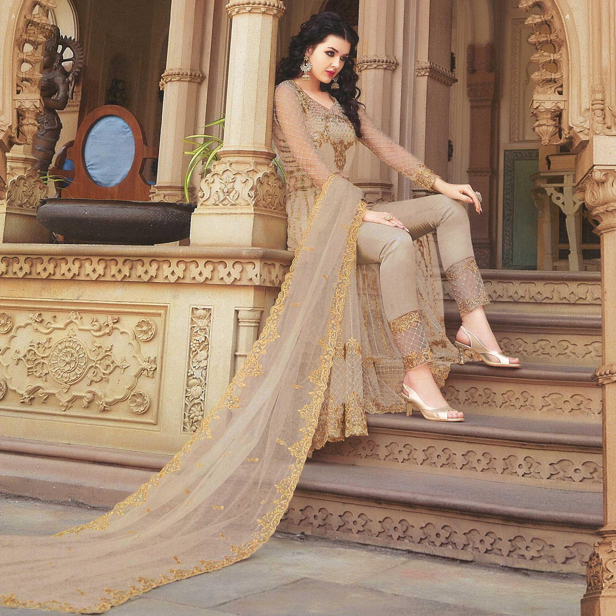 Eye-catching Beige Colored Partywear Embroidered Netted Anarkali With Dual Bottom - Peachmode