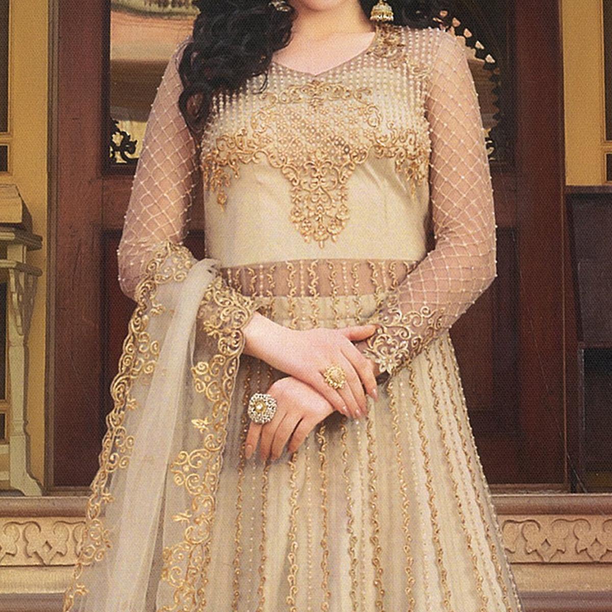 Eye-catching Beige Colored Partywear Embroidered Netted Anarkali With Dual Bottom - Peachmode