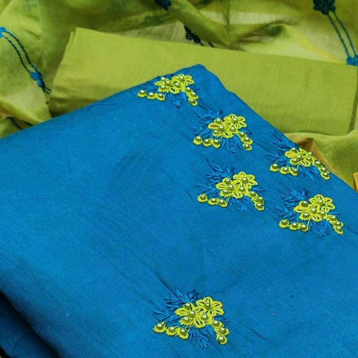 Eye-catching Firozi Colored Casual Wear Embroidered Cotton Dress Material - Peachmode