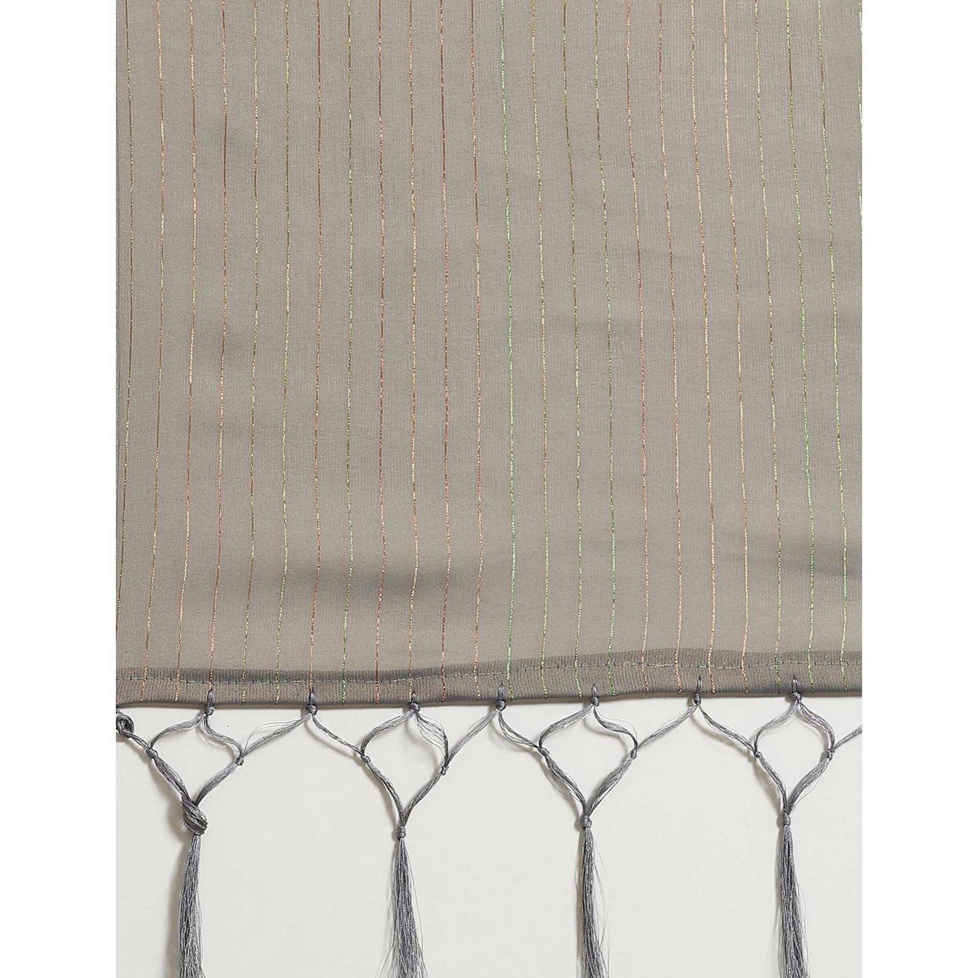 Eye-catching Grey Colored Casual Wear Printed Poly Georgette Saree - Peachmode