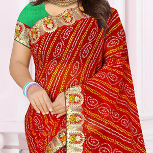 Eye-catching Red Coloured Casual Wear Printed Georgette Saree - Peachmode