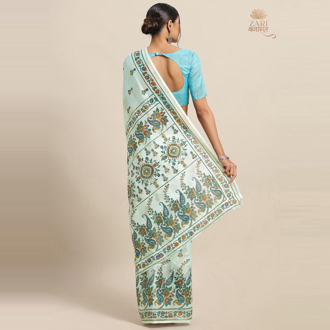 Eye-catching Sky Blue Colored Casual Wear Floral Printed Linen Saree - Peachmode