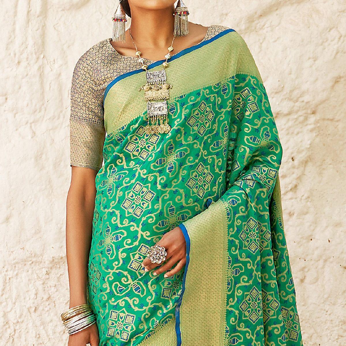 Eye-catching Turquoise Green Colored Festive Wear Woven Silk Saree - Peachmode