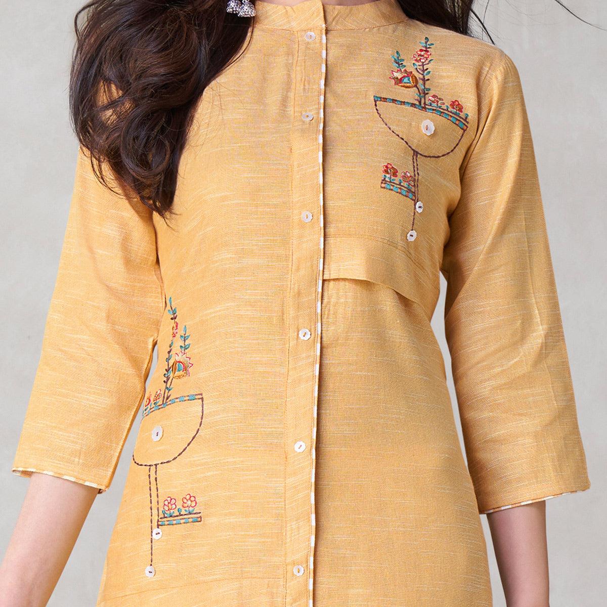 Eye-catching Yellow Colored Party Wear Embroidered Self Weaved Cotton Kurti Pant Set - Peachmode