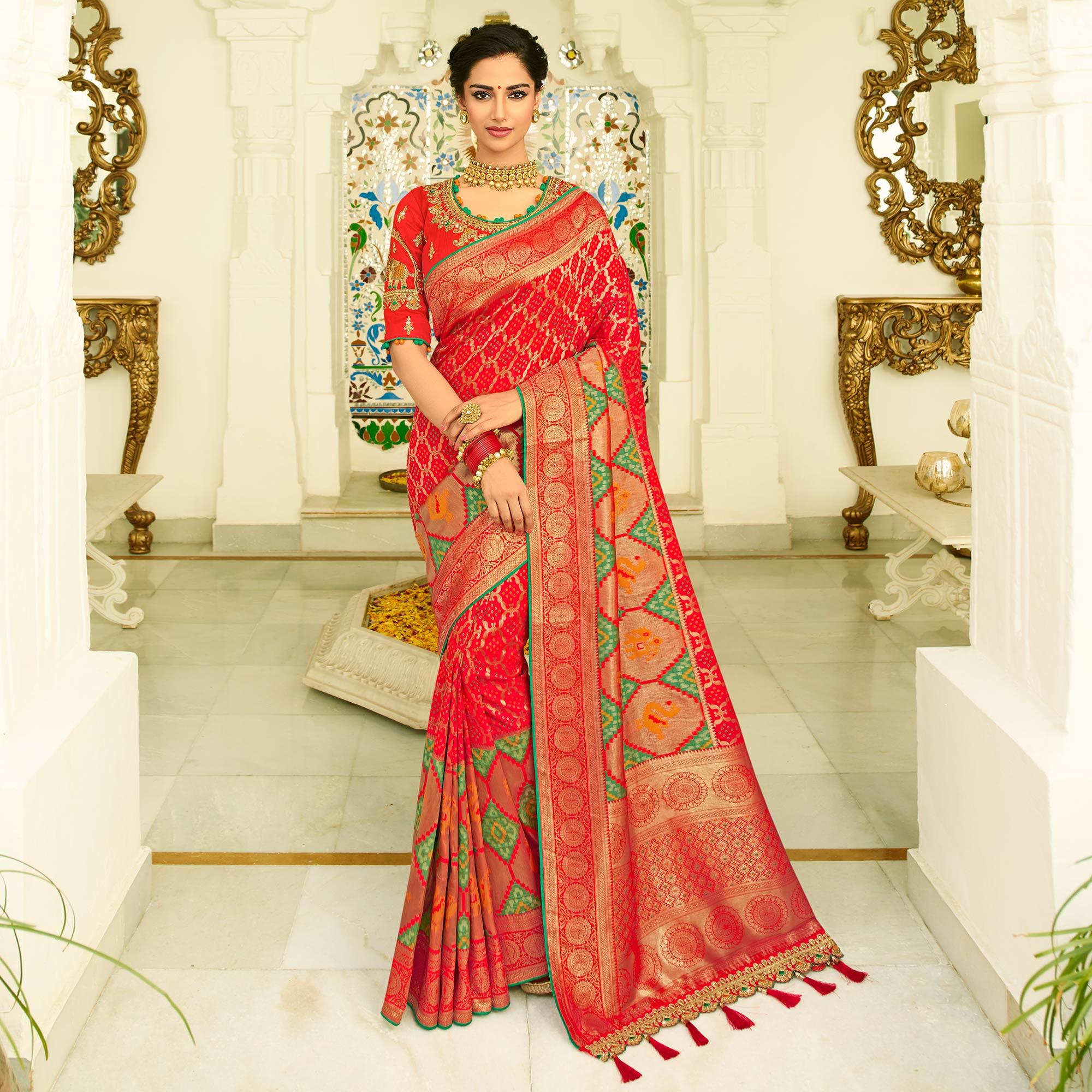 Fantastic Red Colored Festive Wear Woven Silk Saree With Tassels - Peachmode