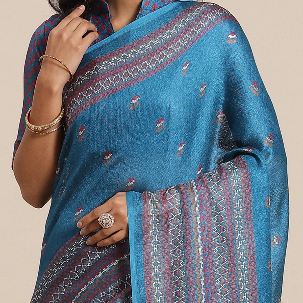 Fantastic Teal Blue Colored Casual Wear Printed Jute Silk Saree - Peachmode