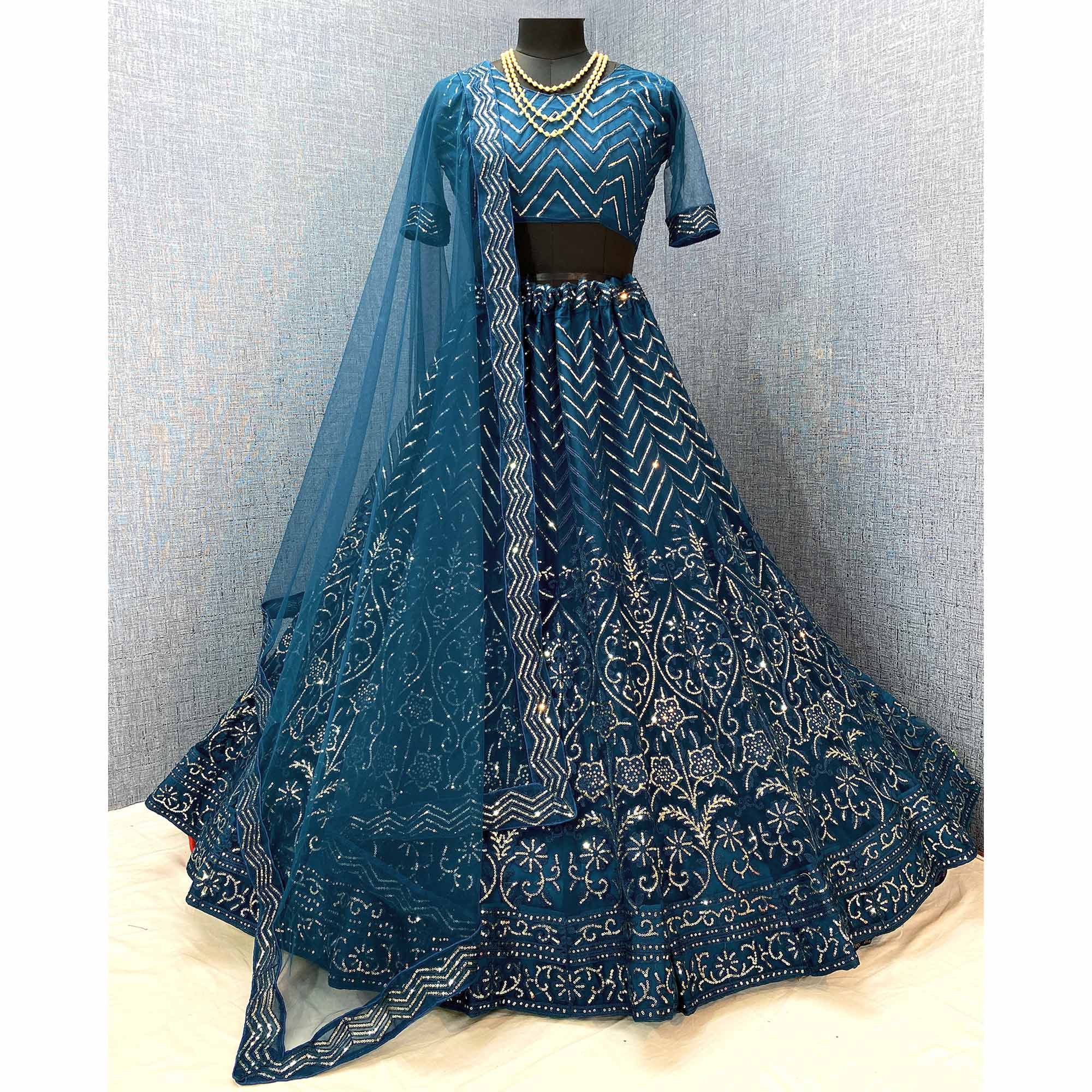 Teal Blue Sequins Embroidered Netted Lehenga Choli
