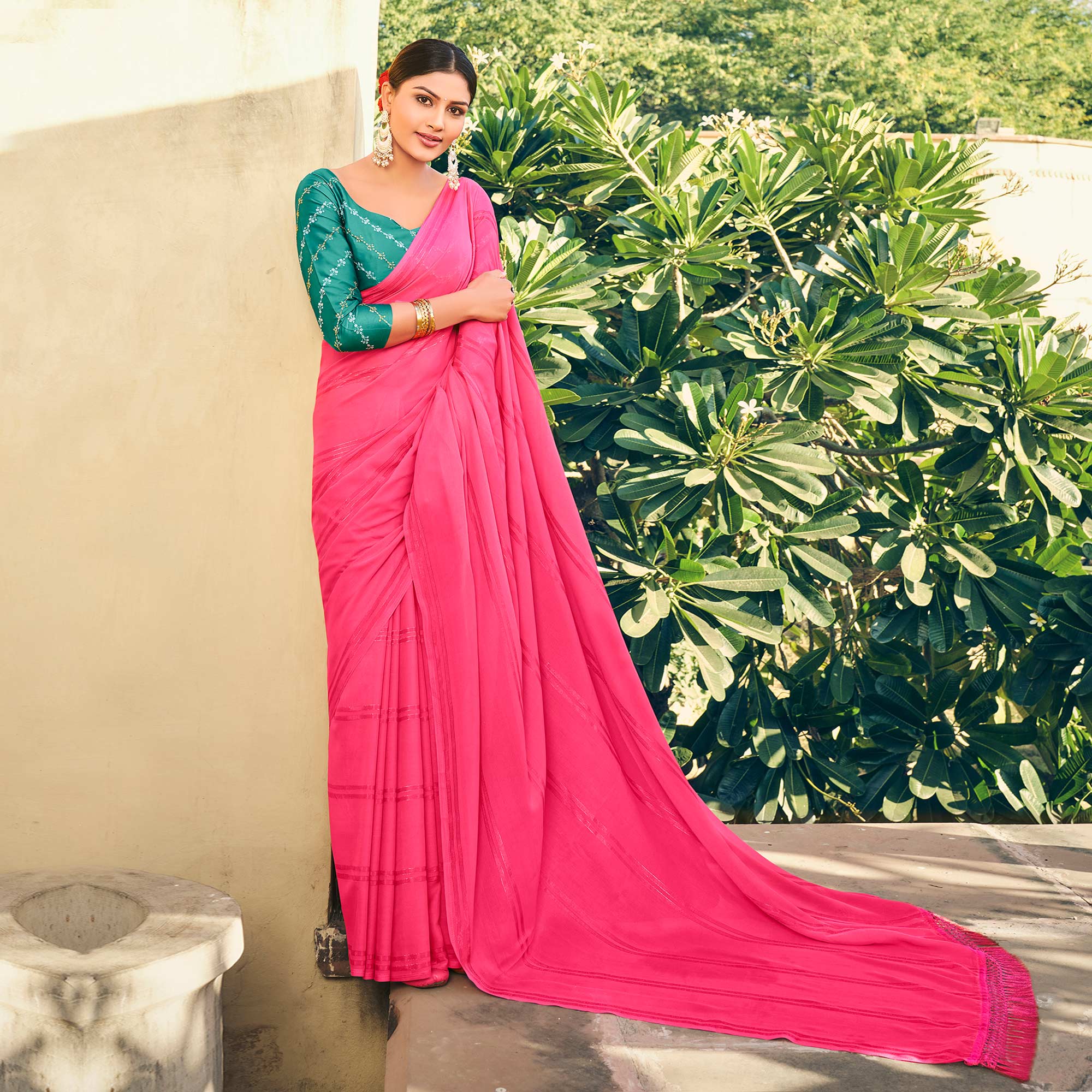 Pink Printed Georgette Saree With Tassels