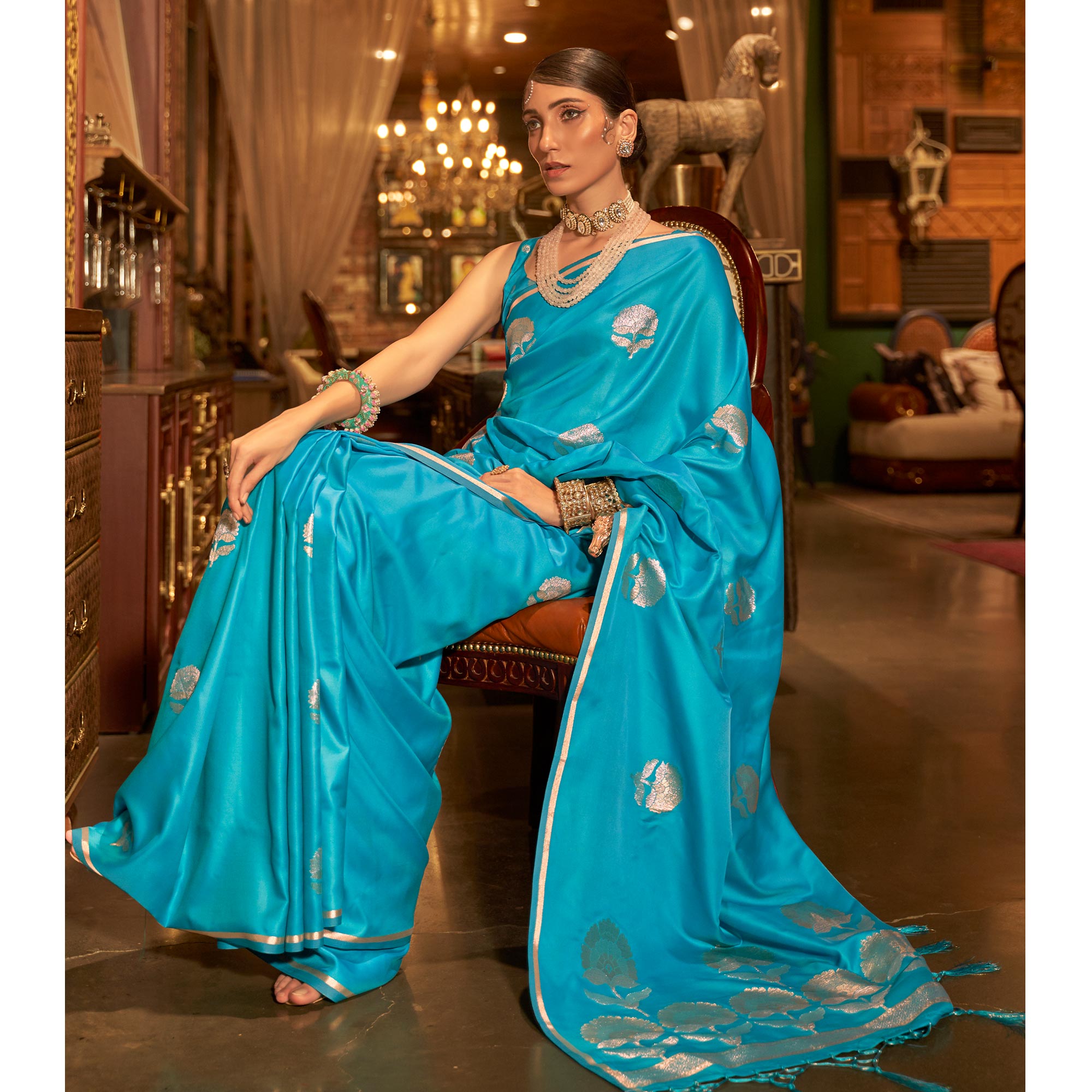 Blue Floral Woven Satin Saree With Tassels