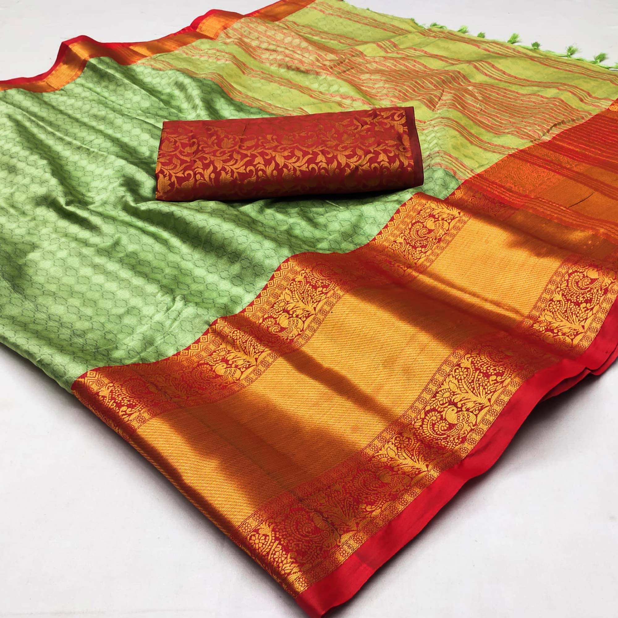 Pista Green Woven Cotton Silk Saree With Tassels