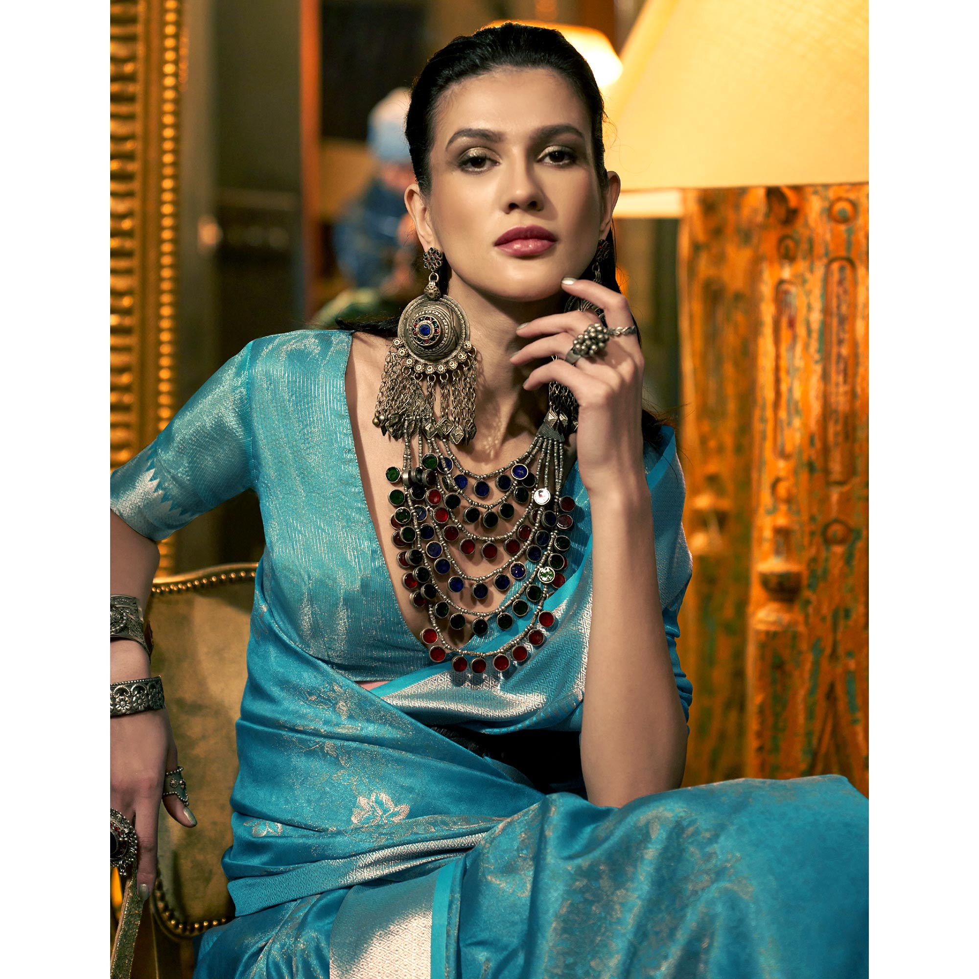 Aqua Blue Woven Organza Saree With Tassels