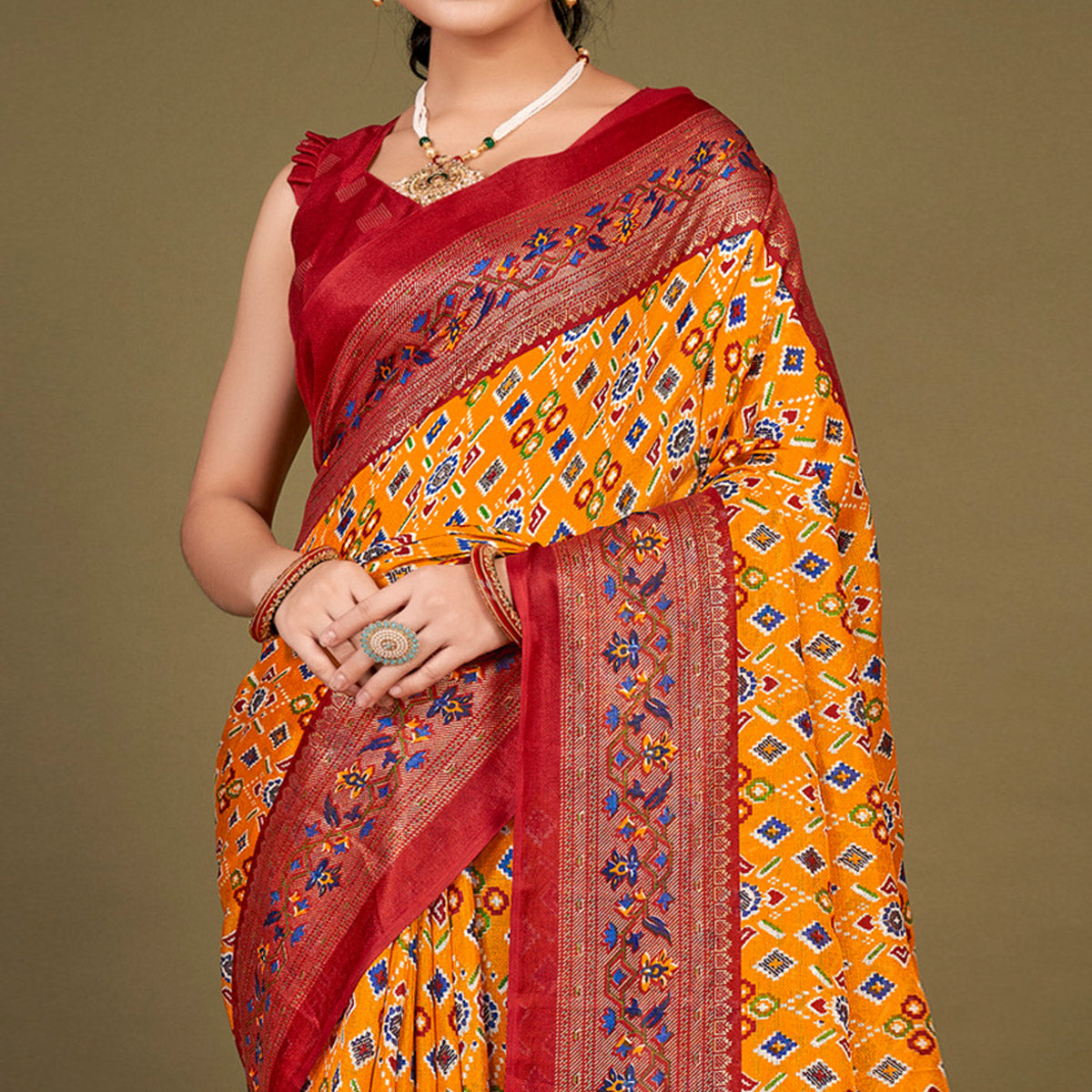 Yellow Printed Jute Patola Saree With Tassels