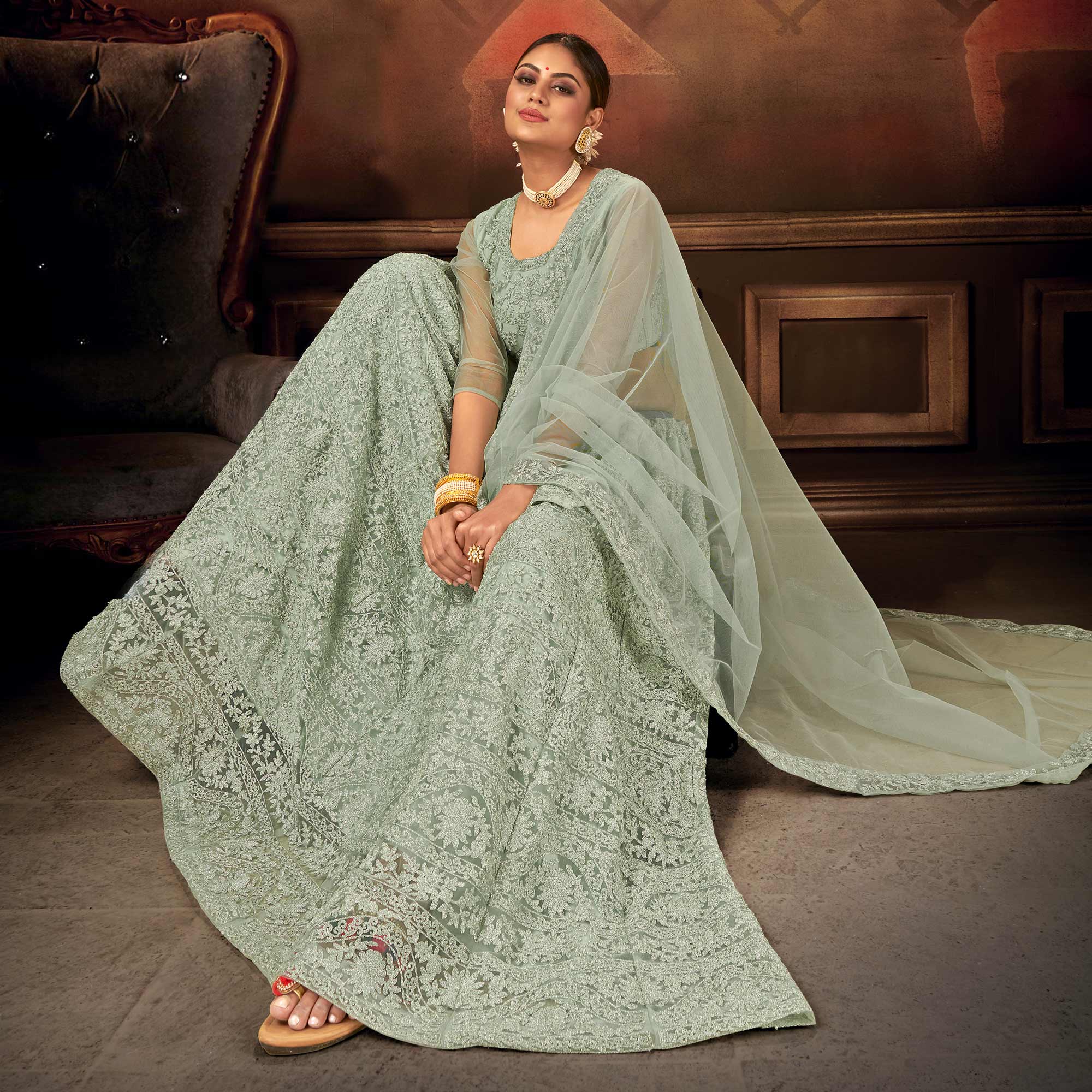 Green Embroidered Netted Lehenga Choli