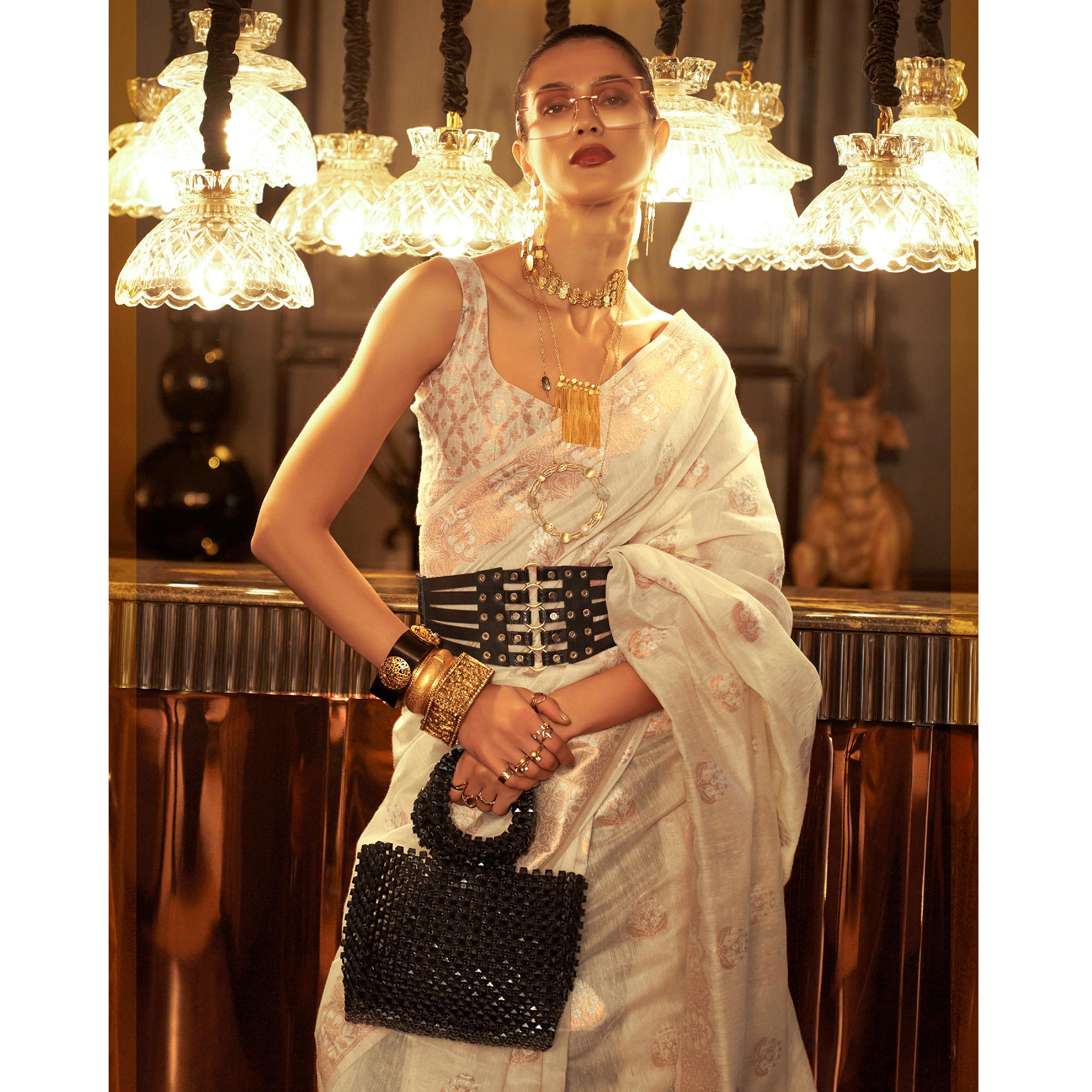 Beige Woven Linen Saree With Tassels