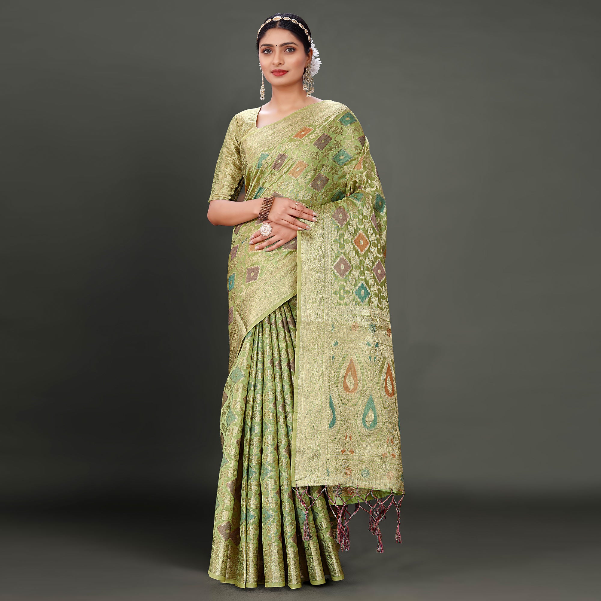 Green Woven Organza Saree With Tassels