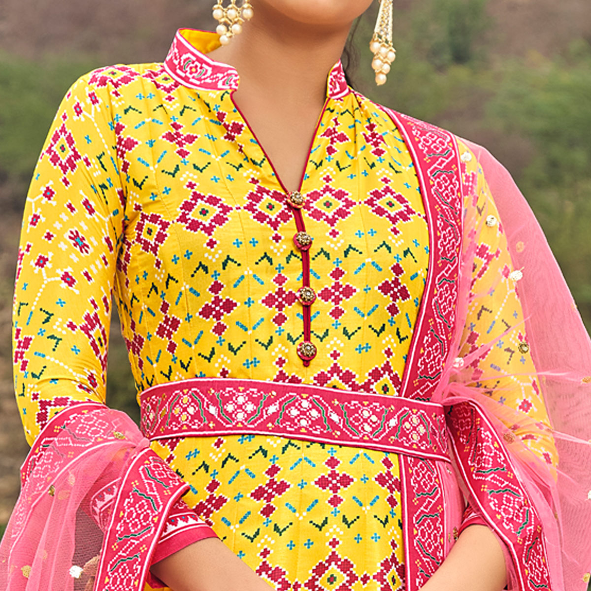 Yellow Patola Digital Printed Dola Silk Gown