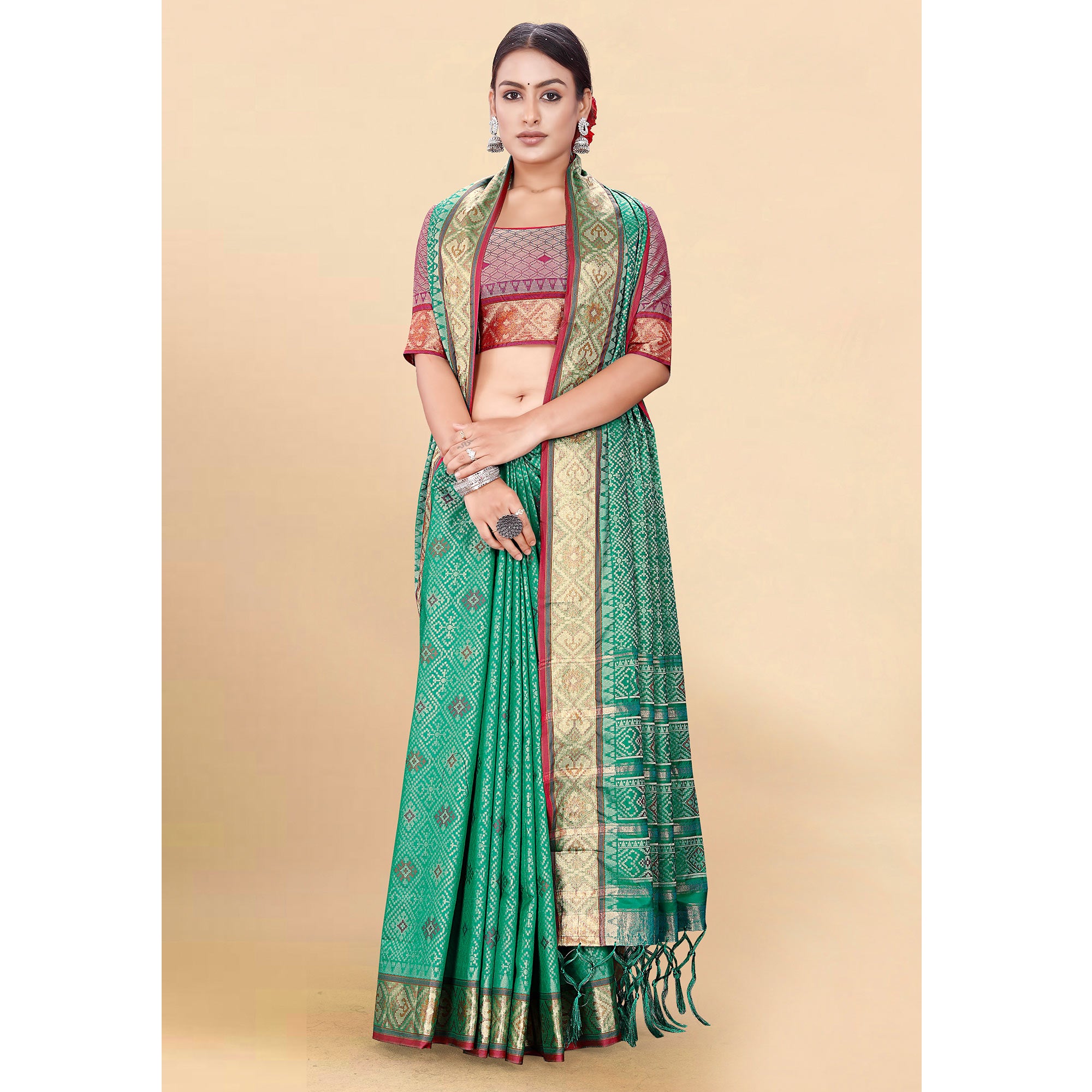 Green Woven Patola Art Silk Saree With Tassels