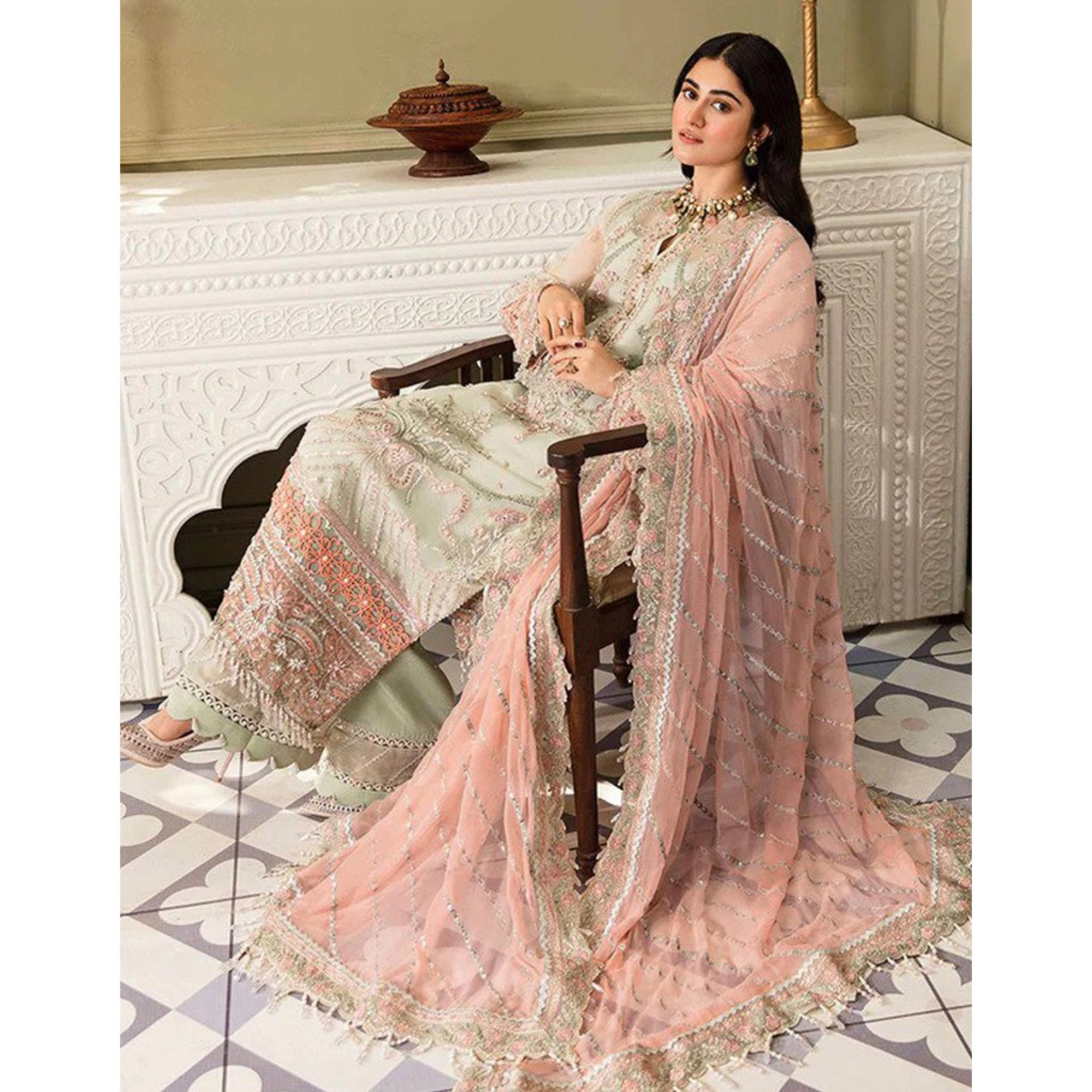 Pista Green And Peach Heavy Embroidered Georgette Pakistani Suit