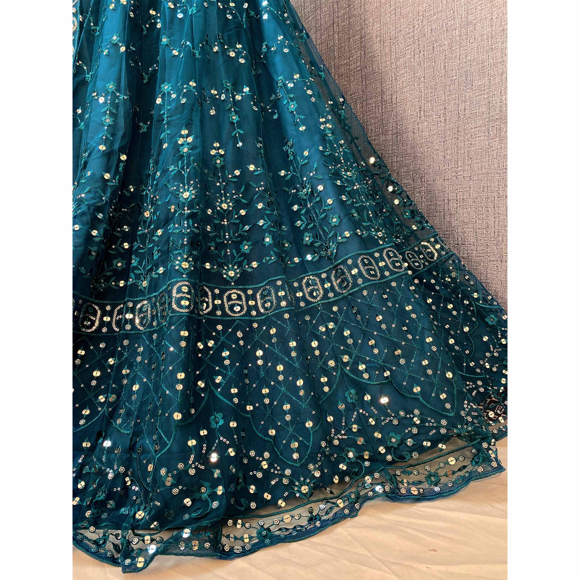 Teal Blue Sequins Embroidered Netted Lehenga Choli