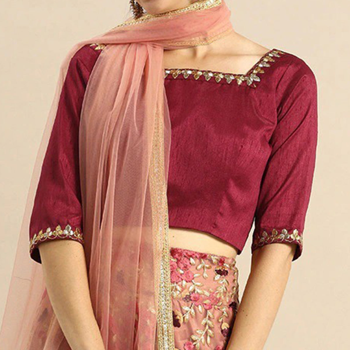 Peach Floral Embroidered Netted Lehenga Choli